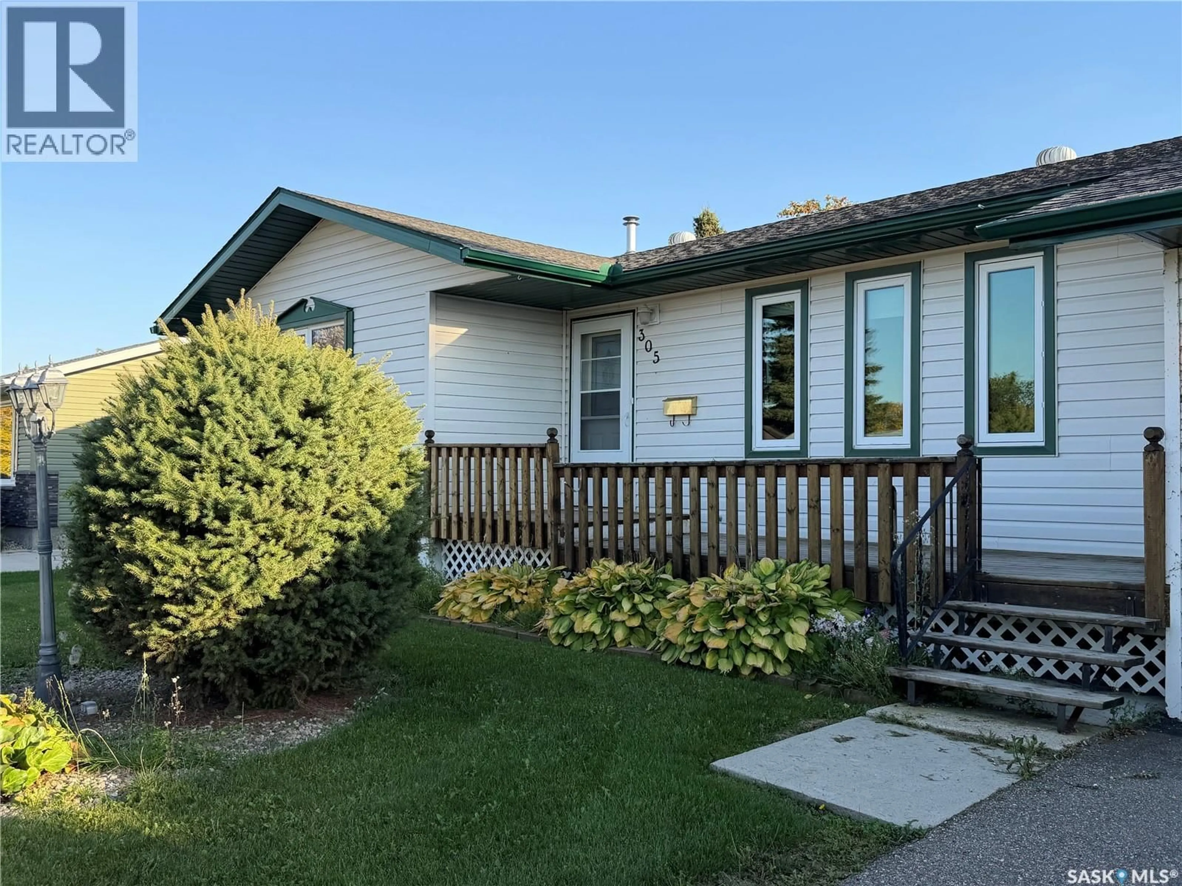 Home with vinyl exterior material, street for 305 CHURCHILL DRIVE, Melfort Saskatchewan S0E1A0