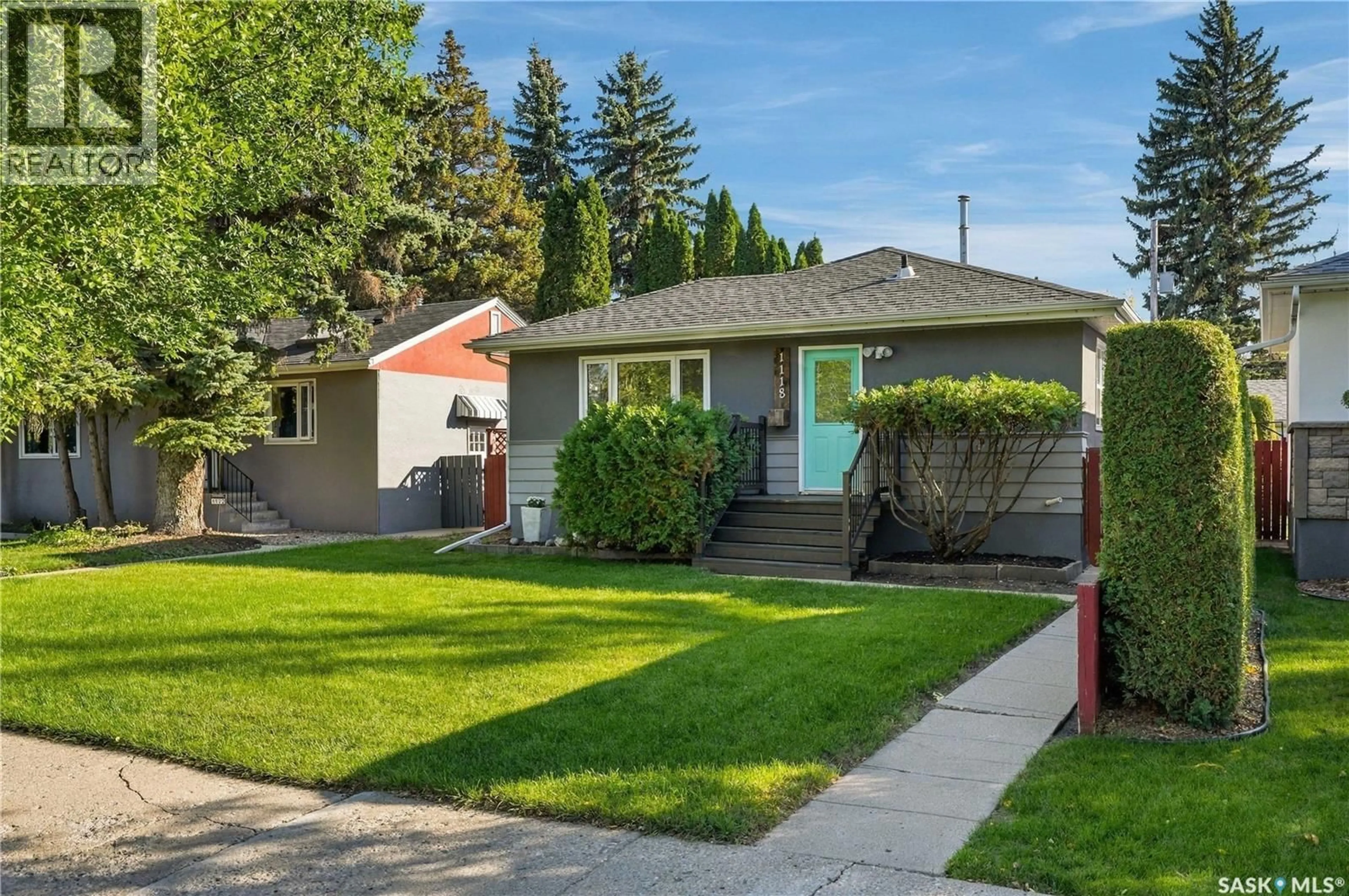 Home with vinyl exterior material, street for 1118 2ND STREET, Saskatoon Saskatchewan S7H1R5