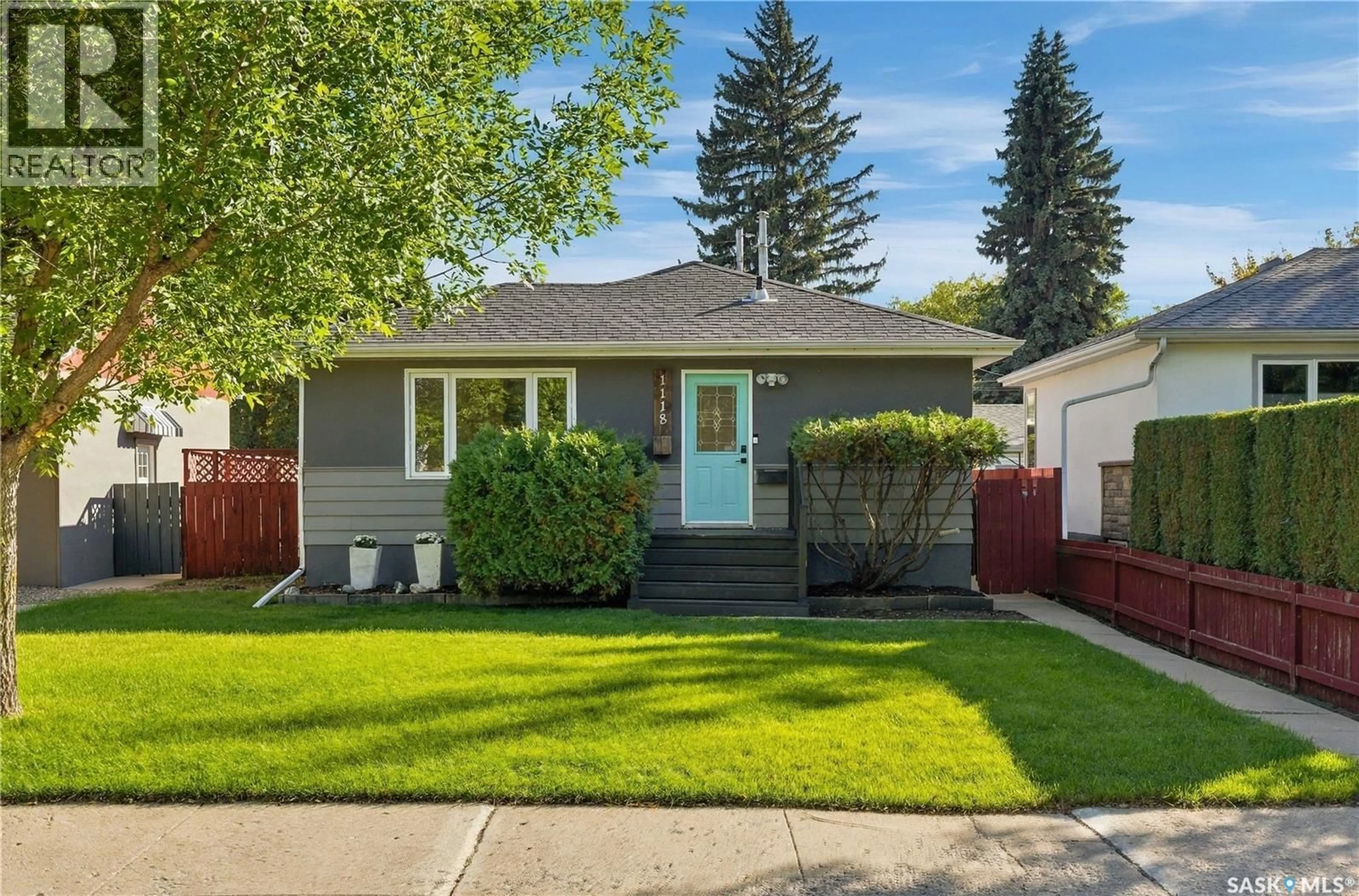 Home with vinyl exterior material, street for 1118 2ND STREET, Saskatoon Saskatchewan S7H1R5