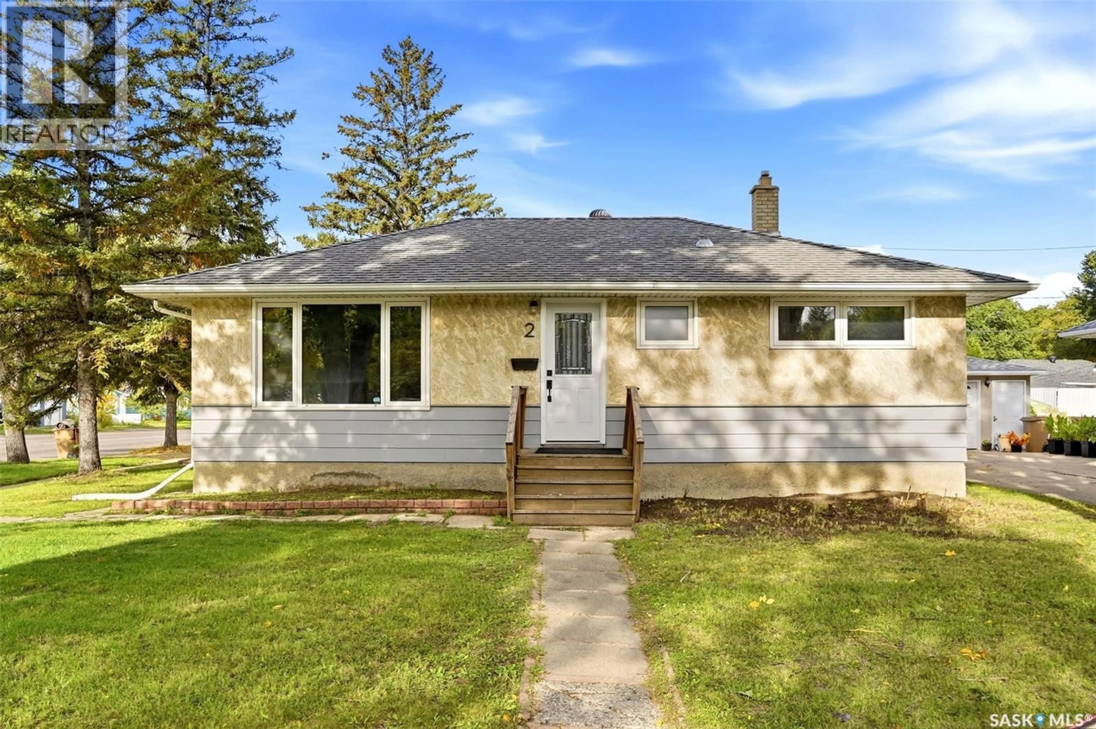 Home with vinyl exterior material, street for 2 SAMPSON PLACE, Regina Saskatchewan S4R4R4