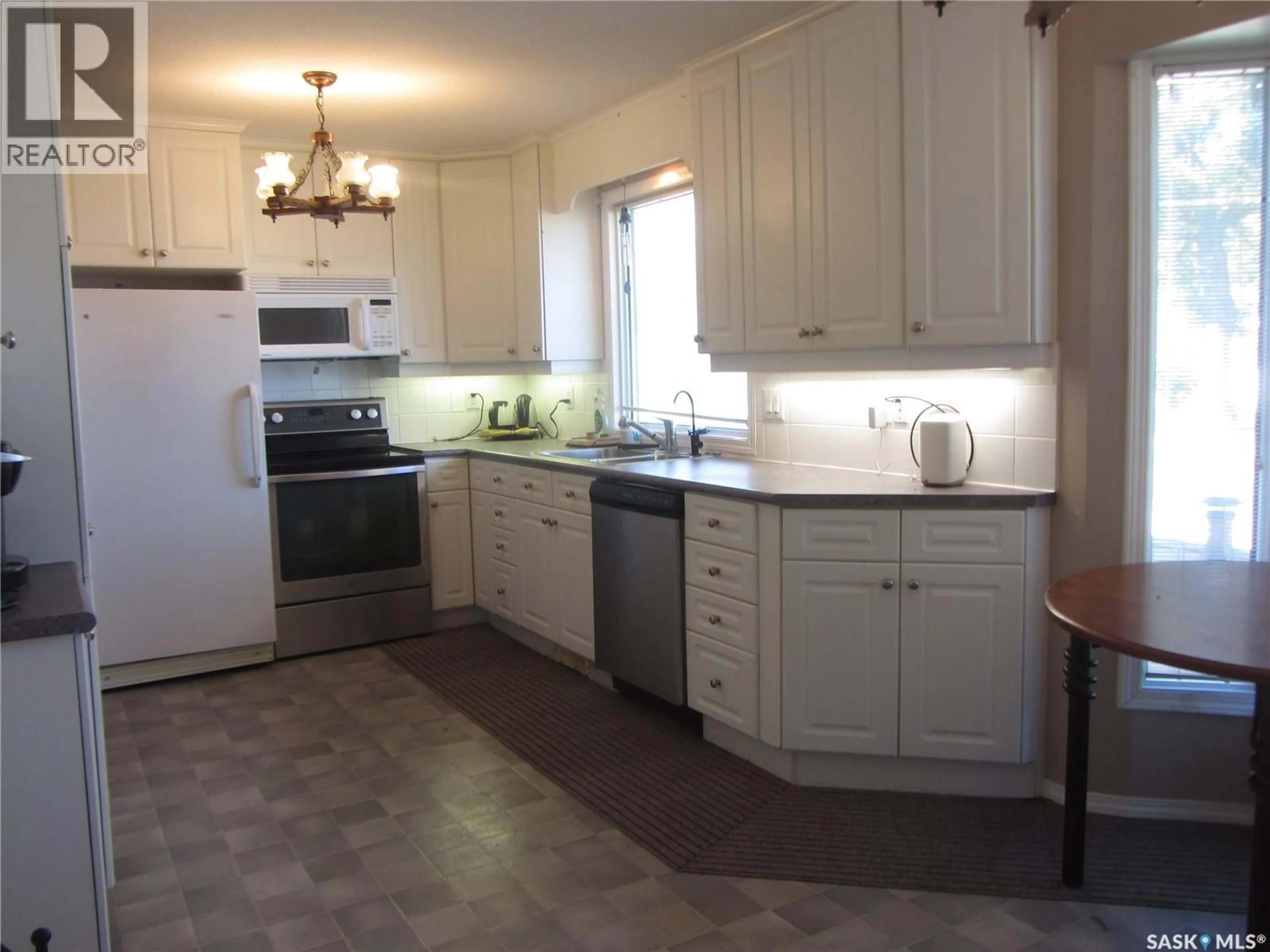 Standard kitchen, ceramic/tile floor for 2400 MCPHERSON AVENUE, Saskatoon Saskatchewan S7J0S9