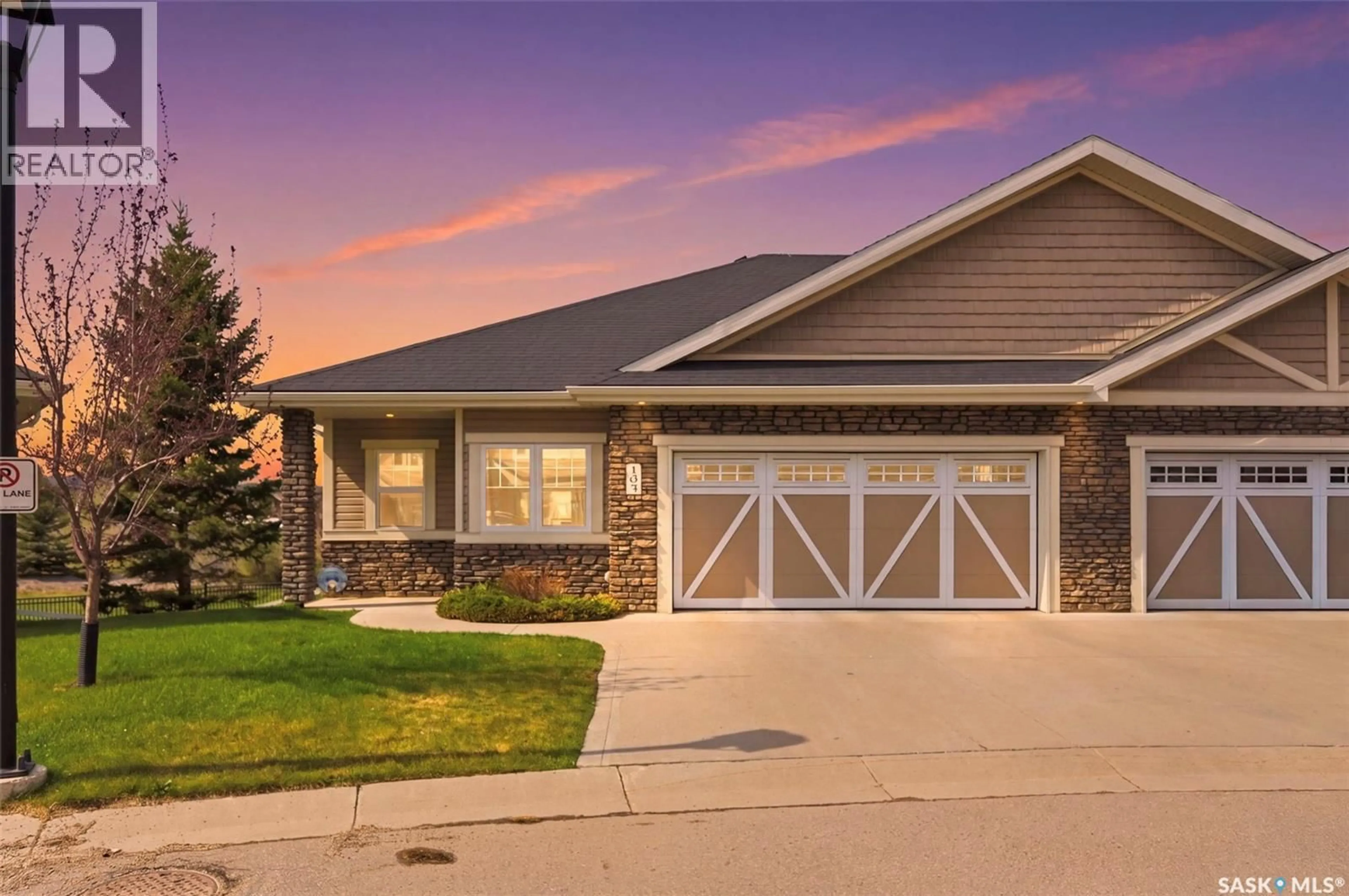 Home with vinyl exterior material, street for 105 - 542 PRINGLE CRESCENT, Saskatoon Saskatchewan S7T0W9