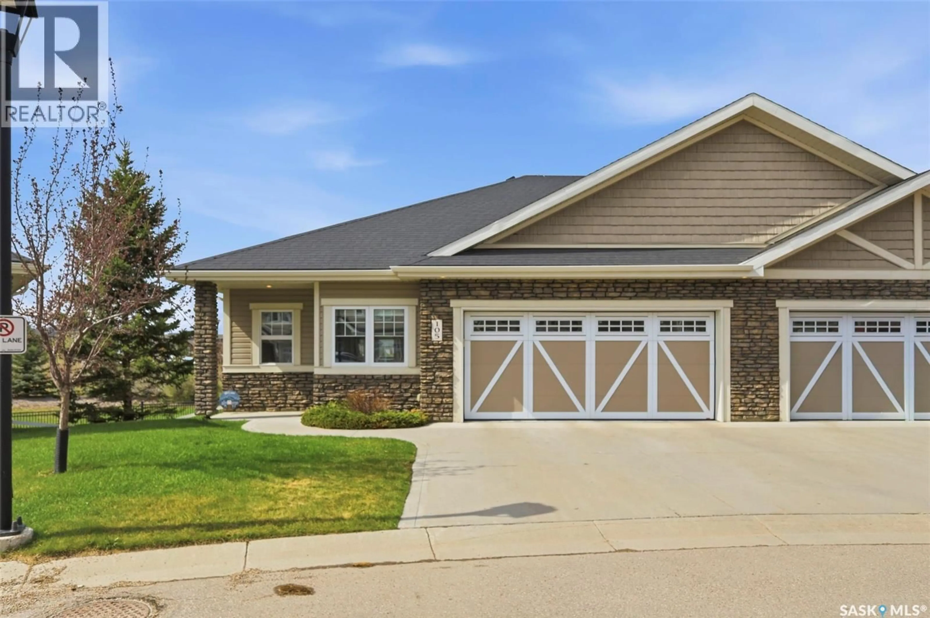 Home with brick exterior material, street for 105 - 542 PRINGLE CRESCENT, Saskatoon Saskatchewan S7T0W9