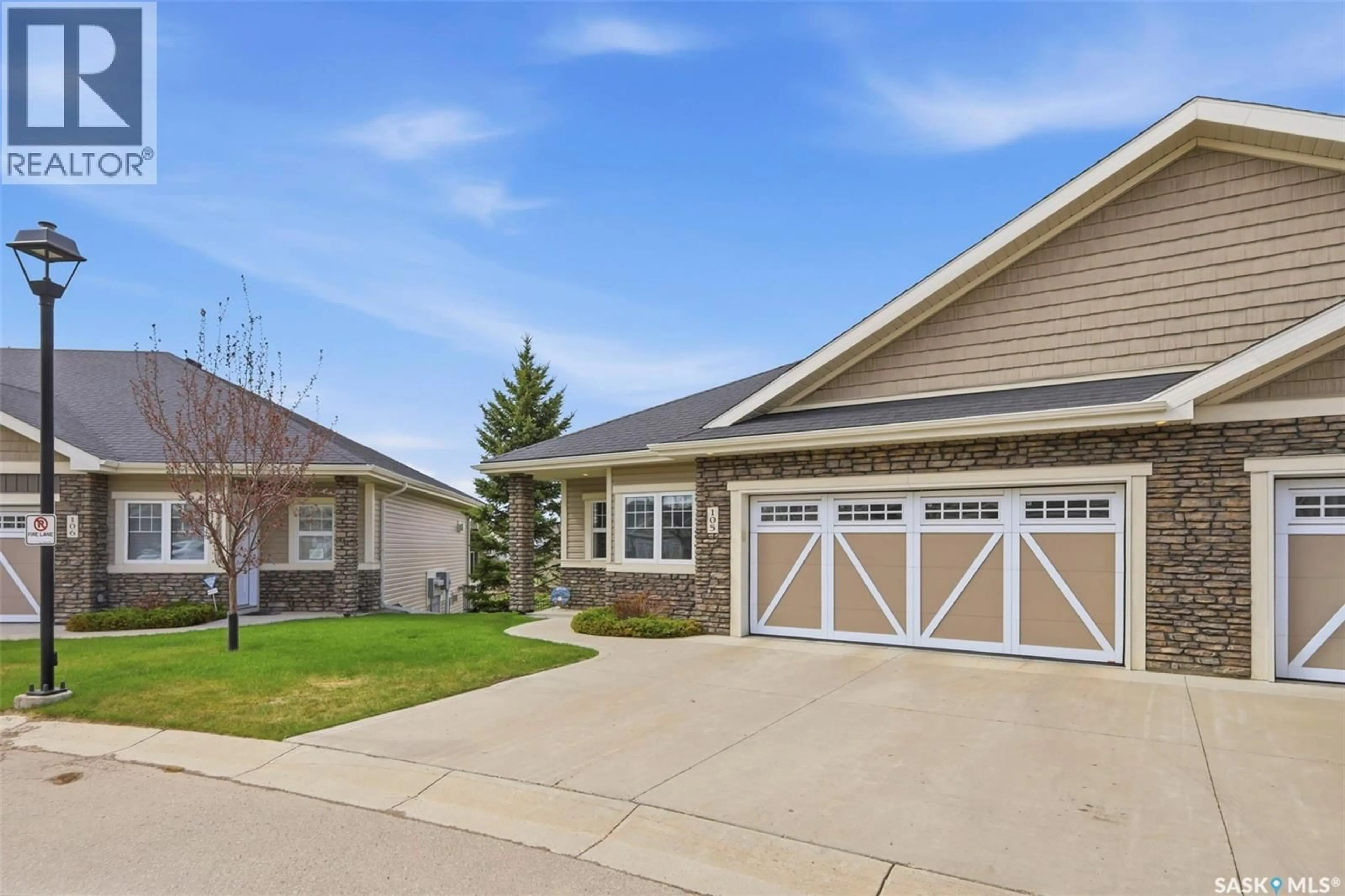 Home with vinyl exterior material, street for 105 - 542 PRINGLE CRESCENT, Saskatoon Saskatchewan S7T0W9