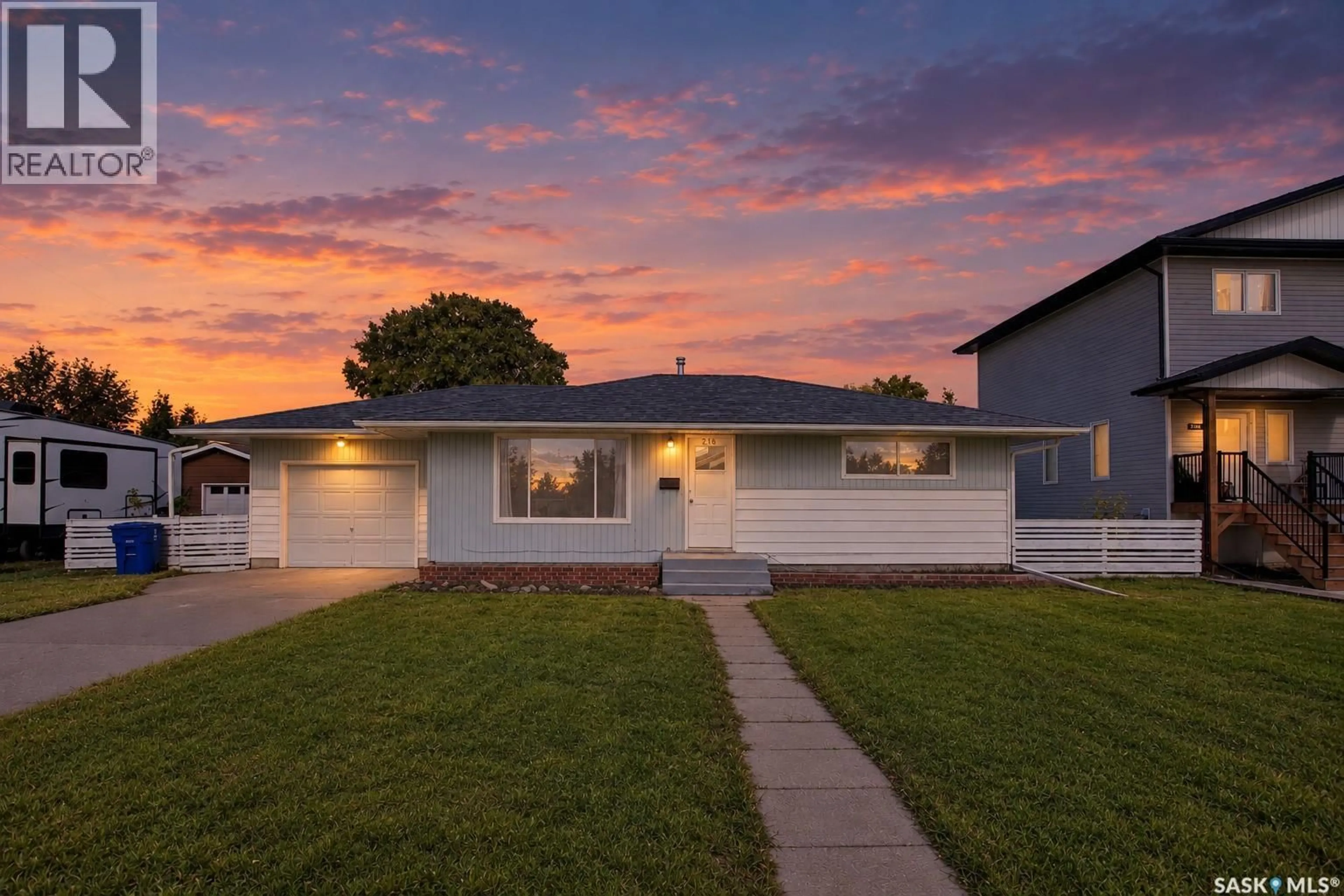 Home with vinyl exterior material, street for 216 MAIN STREET, Warman Saskatchewan S0K4S0