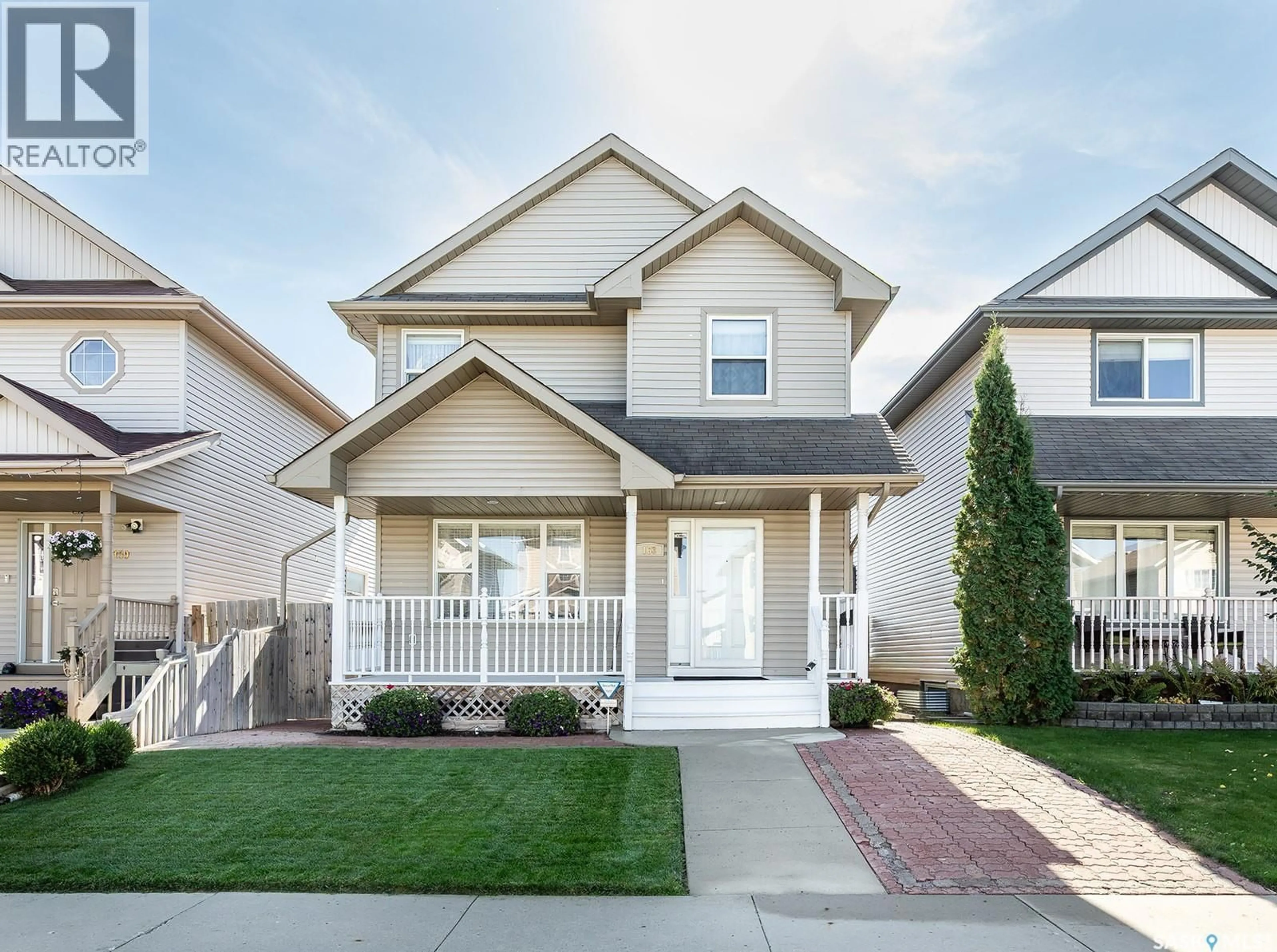 Home with vinyl exterior material, street for 163 BLAKENEY CRESCENT, Saskatoon Saskatchewan S7L7N5