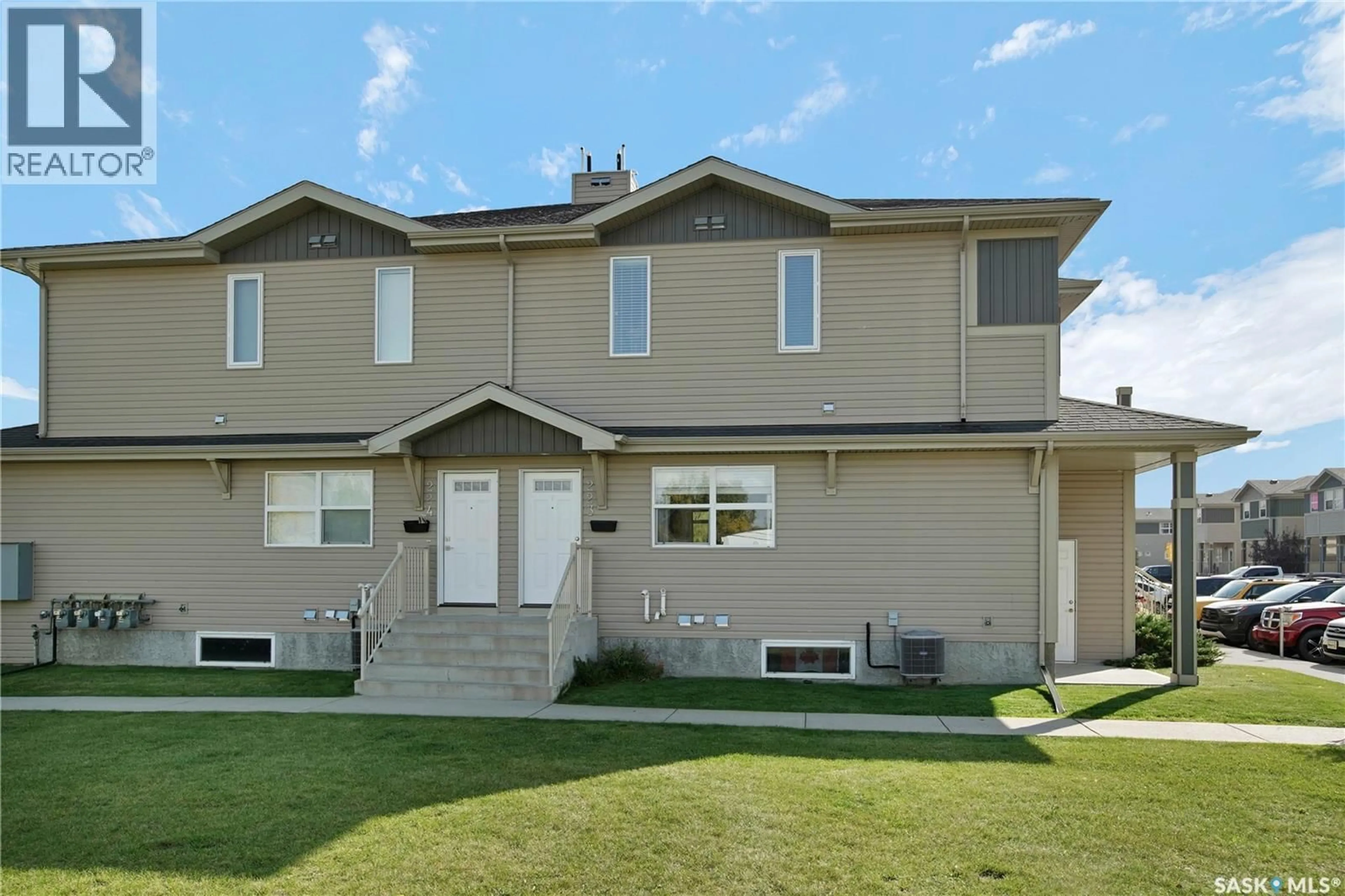 Home with vinyl exterior material, street for 223 100 CHAPARRAL BOULEVARD, Martensville Saskatchewan S0K0A2
