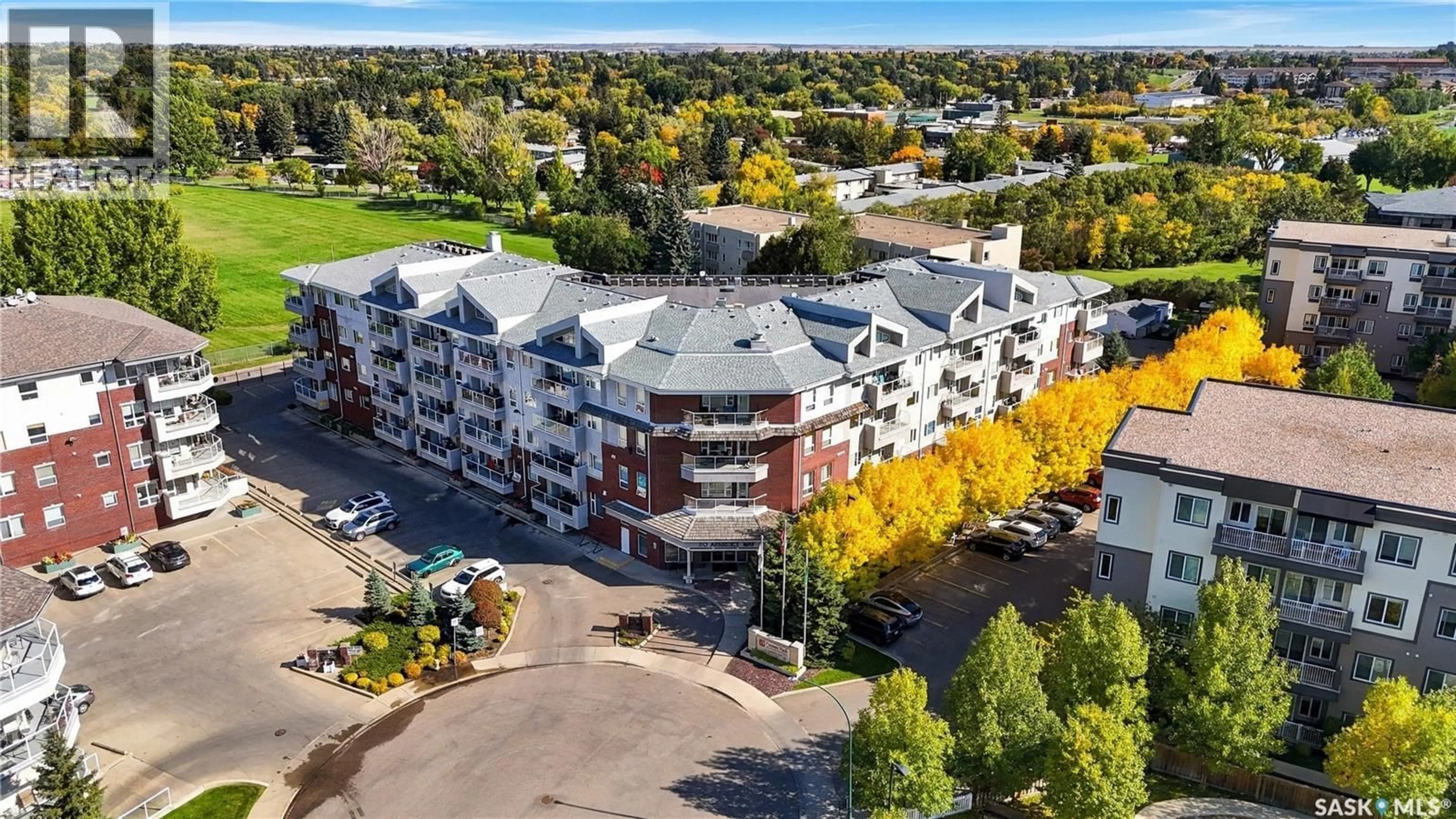A pic from outside/outdoor area/front of a property/back of a property/a pic from drone, unknown for 305 110 ARMISTICE WAY, Saskatoon Saskatchewan S7J5L8