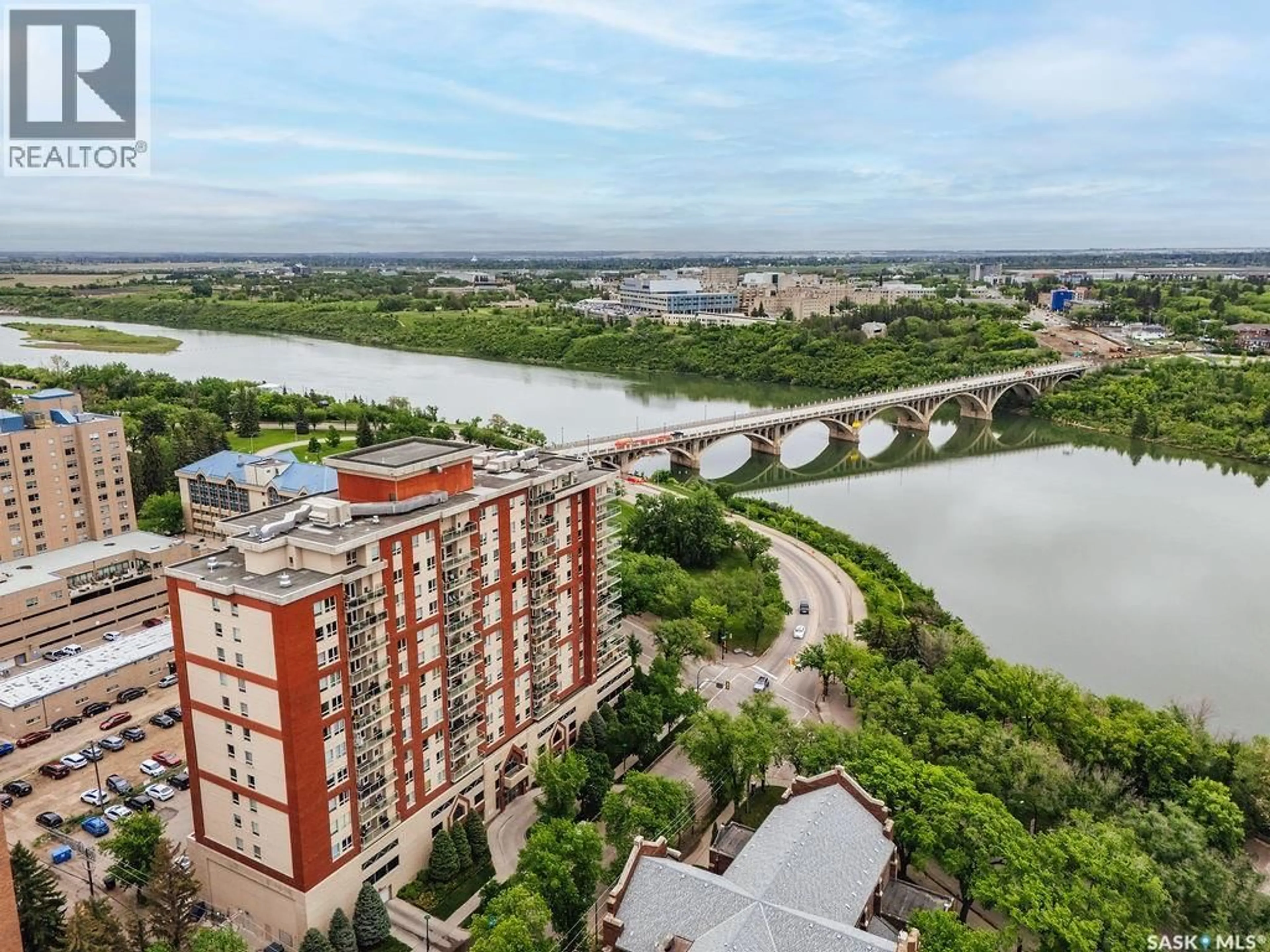 A pic from outside/outdoor area/front of a property/back of a property/a pic from drone, water/lake/river/ocean view for 902 - 409 SPADINA CRESCENT, Saskatoon Saskatchewan S7K0G8