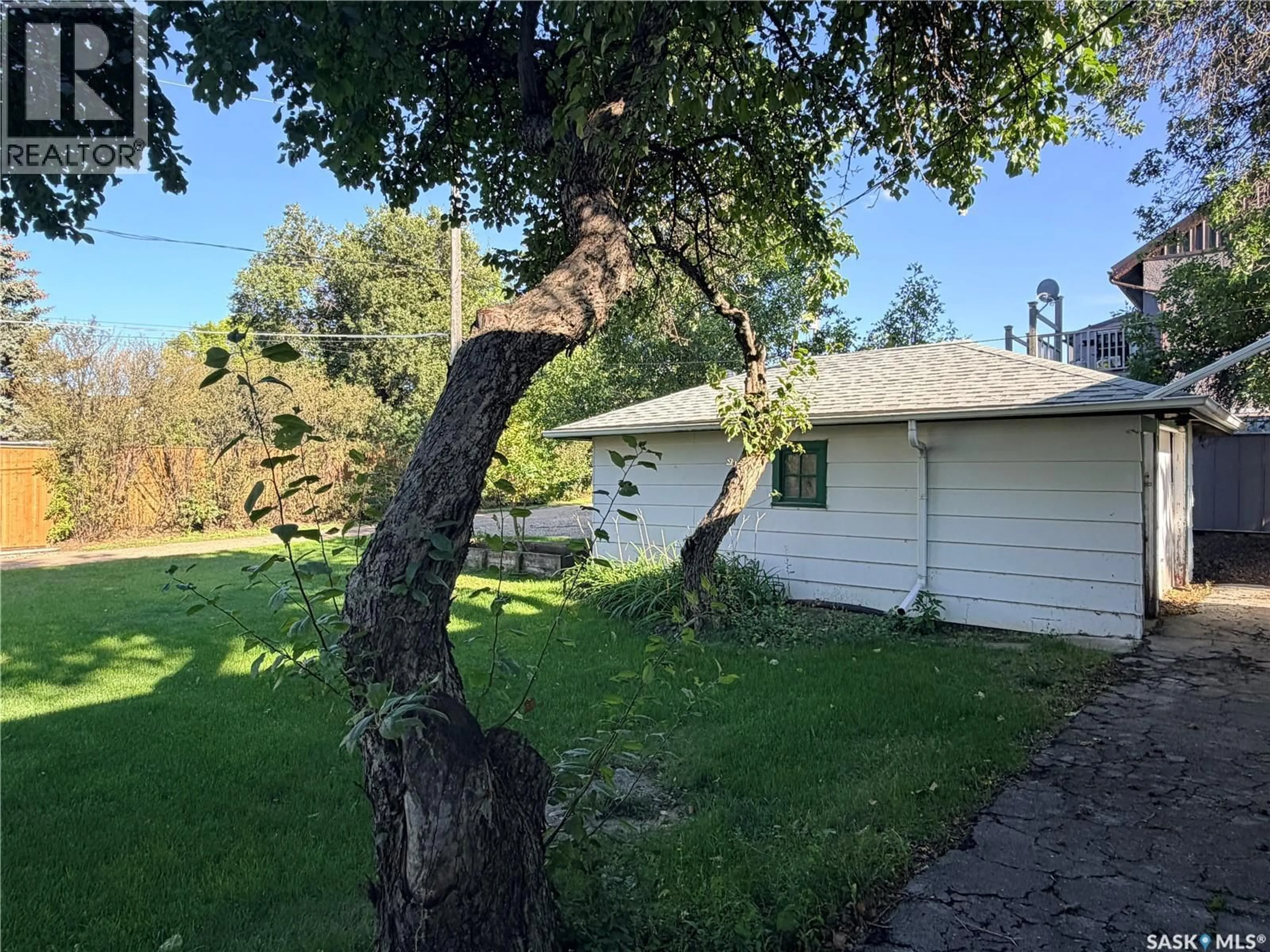 A pic from outside/outdoor area/front of a property/back of a property/a pic from drone, unknown for 121 EMPIRE ROAD, Assiniboia Saskatchewan S0H0B0