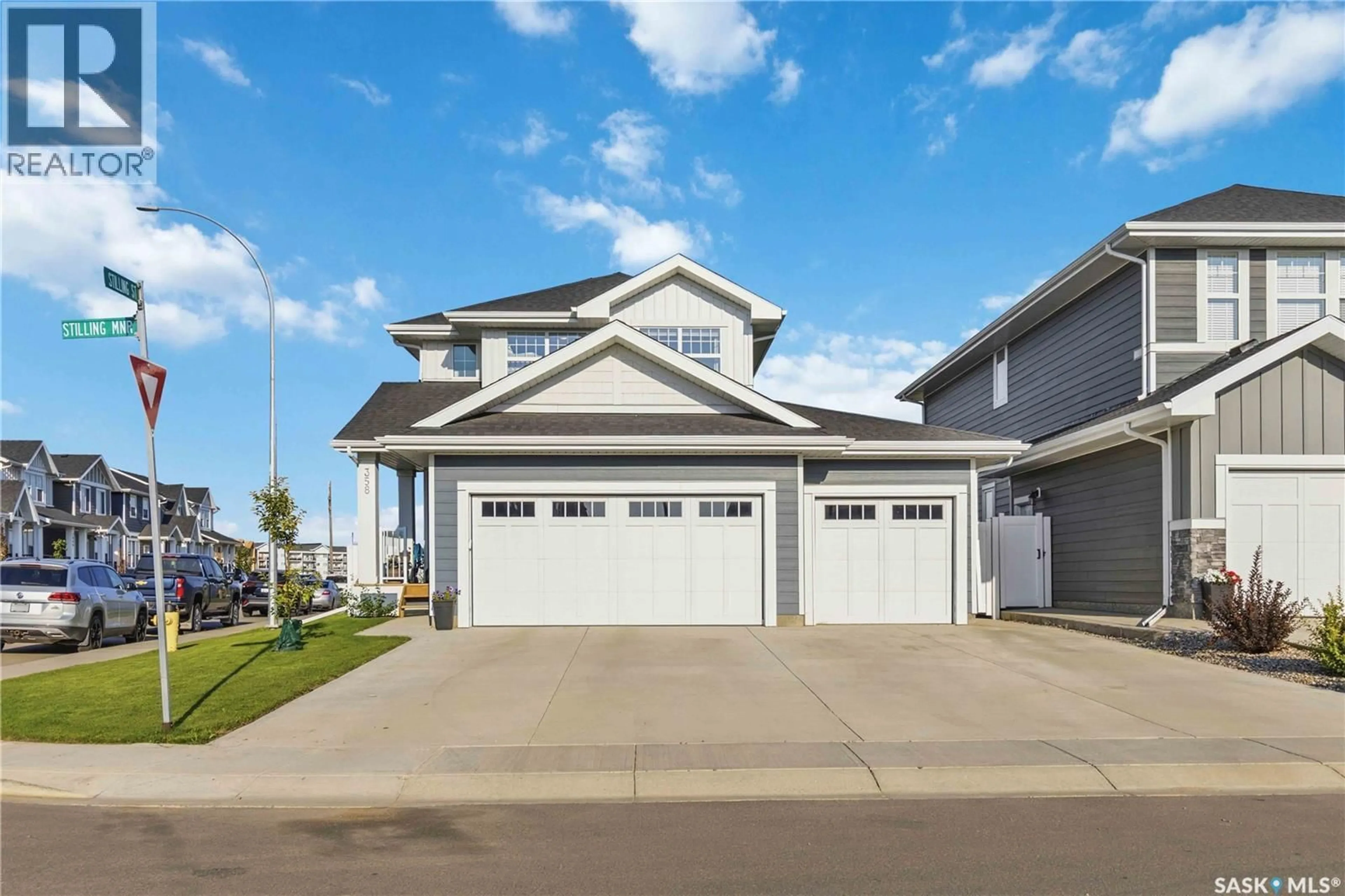 Home with vinyl exterior material, street for 358 STILLING MANOR, Saskatoon Saskatchewan S7V0Y8