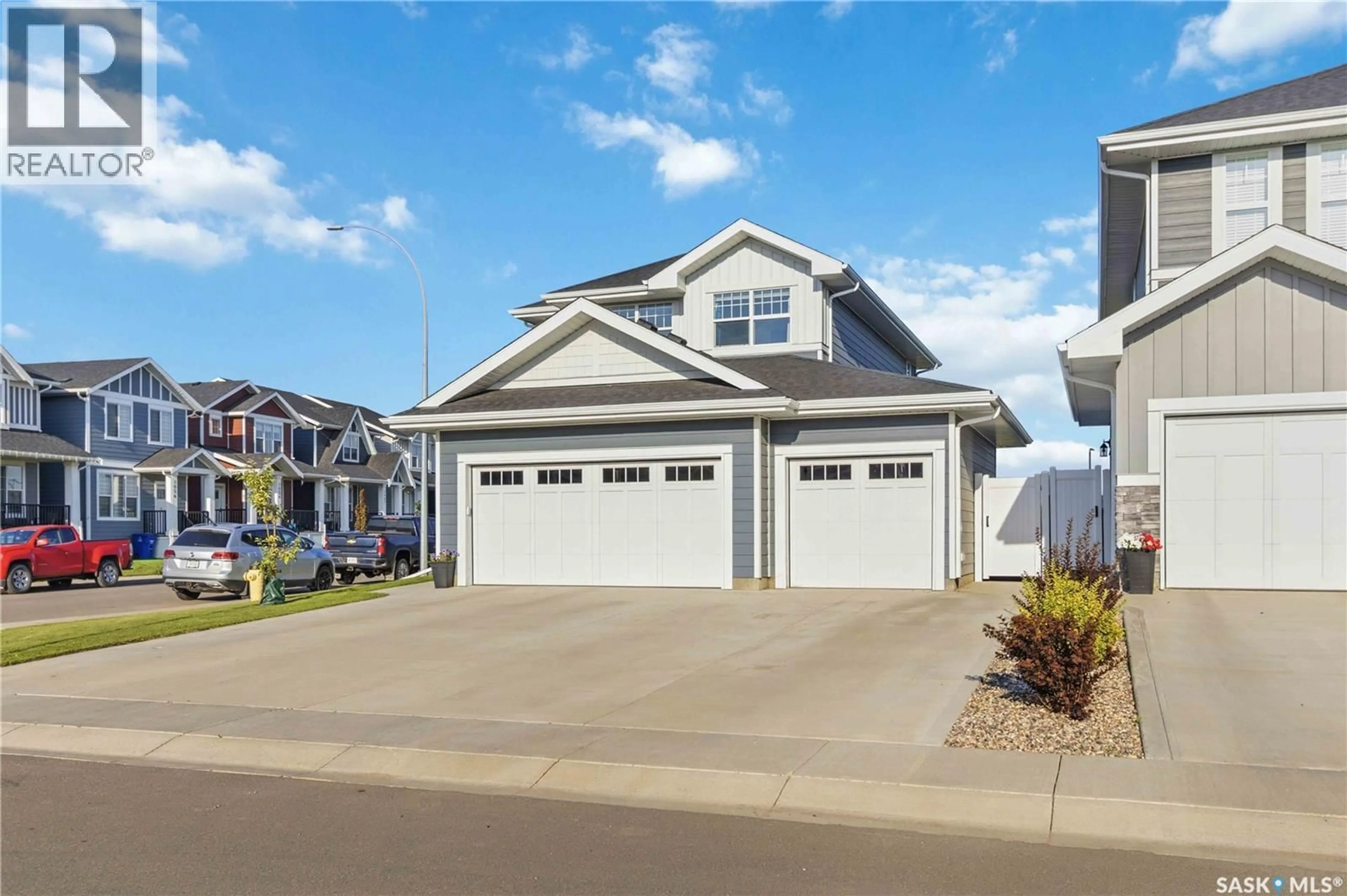 Home with vinyl exterior material, street for 358 STILLING MANOR, Saskatoon Saskatchewan S7V0Y8