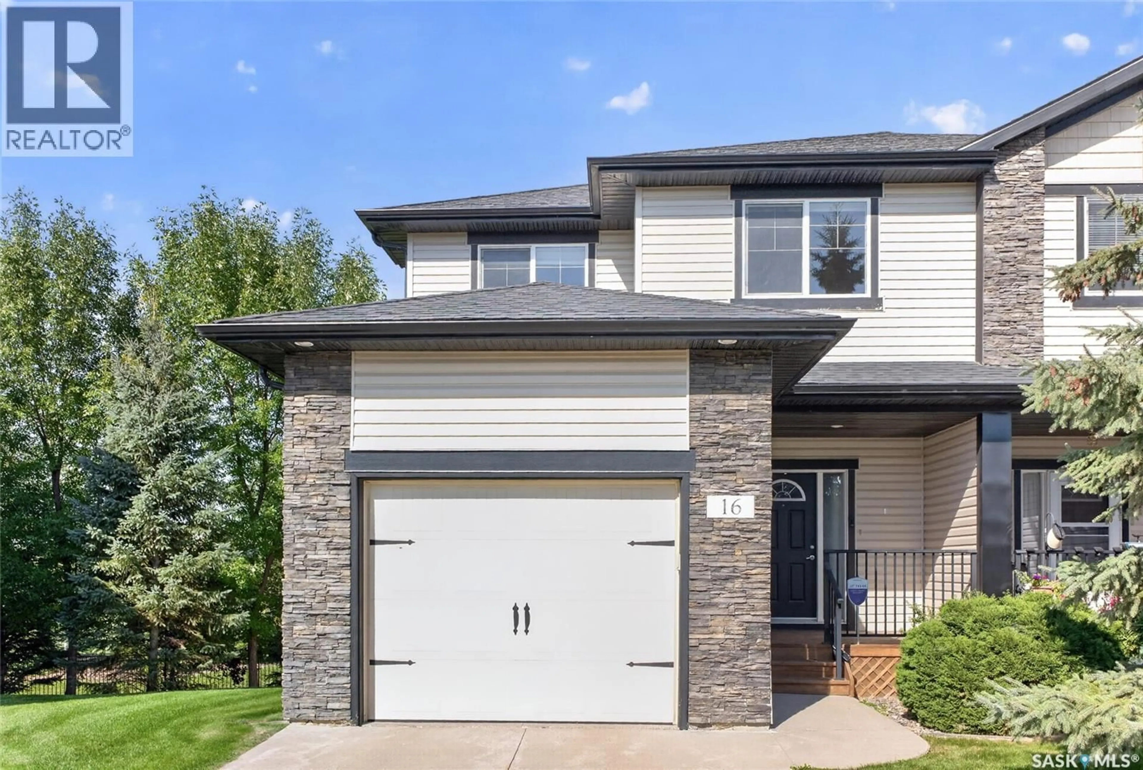 Home with brick exterior material, street for 215 - 16 HAMPTON GREEN, Saskatoon Saskatchewan S7R0G7