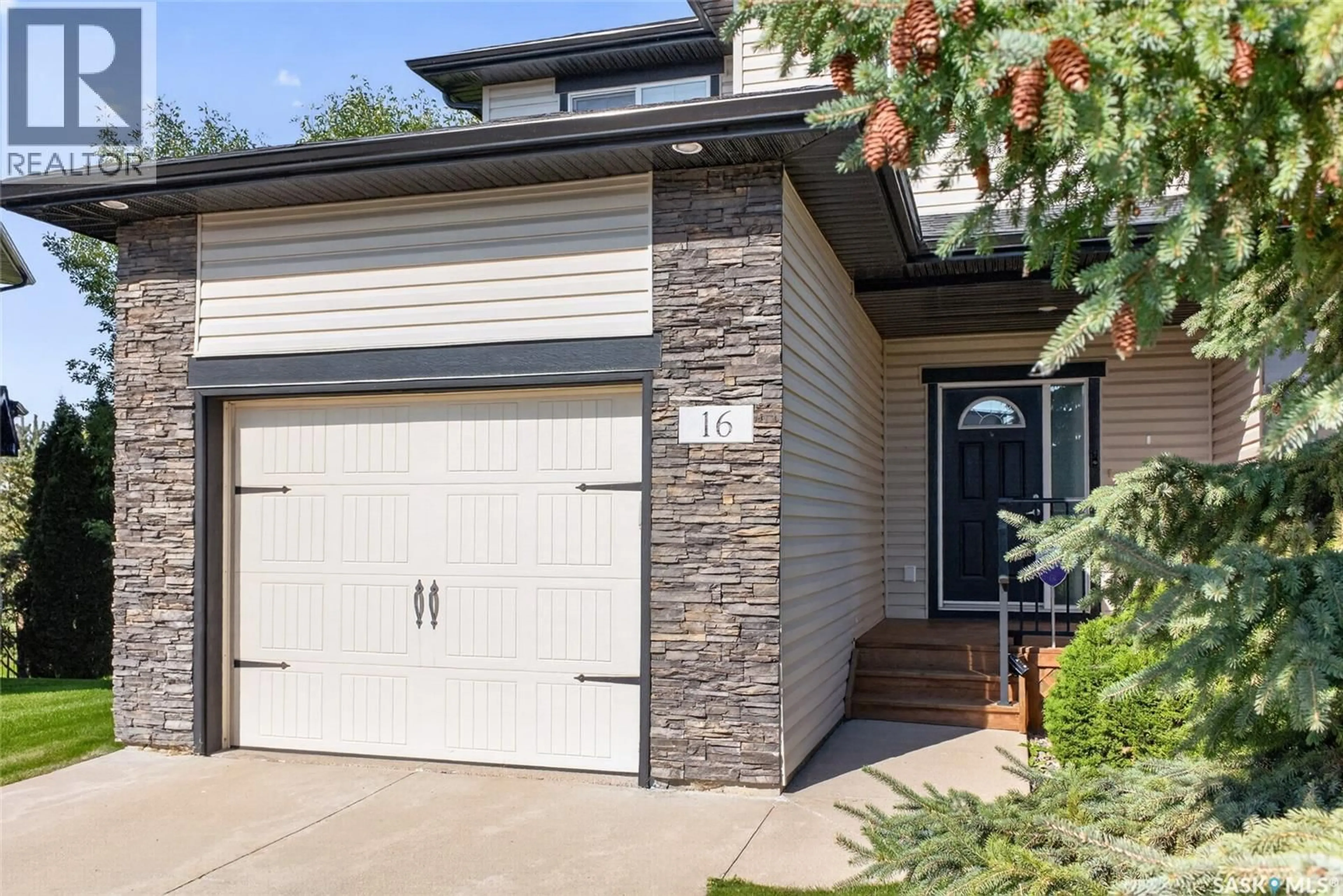 Home with brick exterior material, street for 215 - 16 HAMPTON GREEN, Saskatoon Saskatchewan S7R0G7