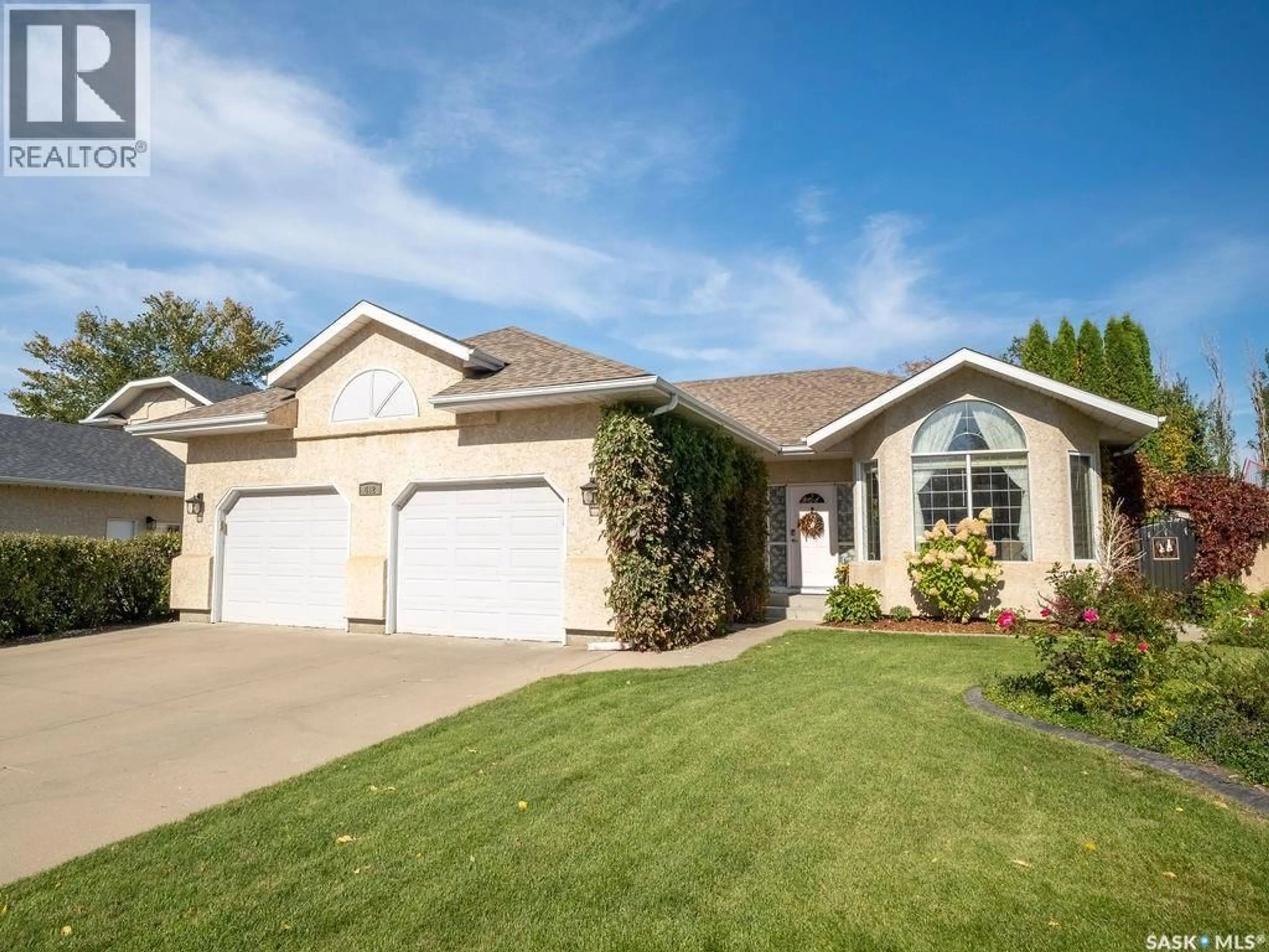 Home with vinyl exterior material, street for 412 4TH STREET, Warman Saskatchewan S0K4S0