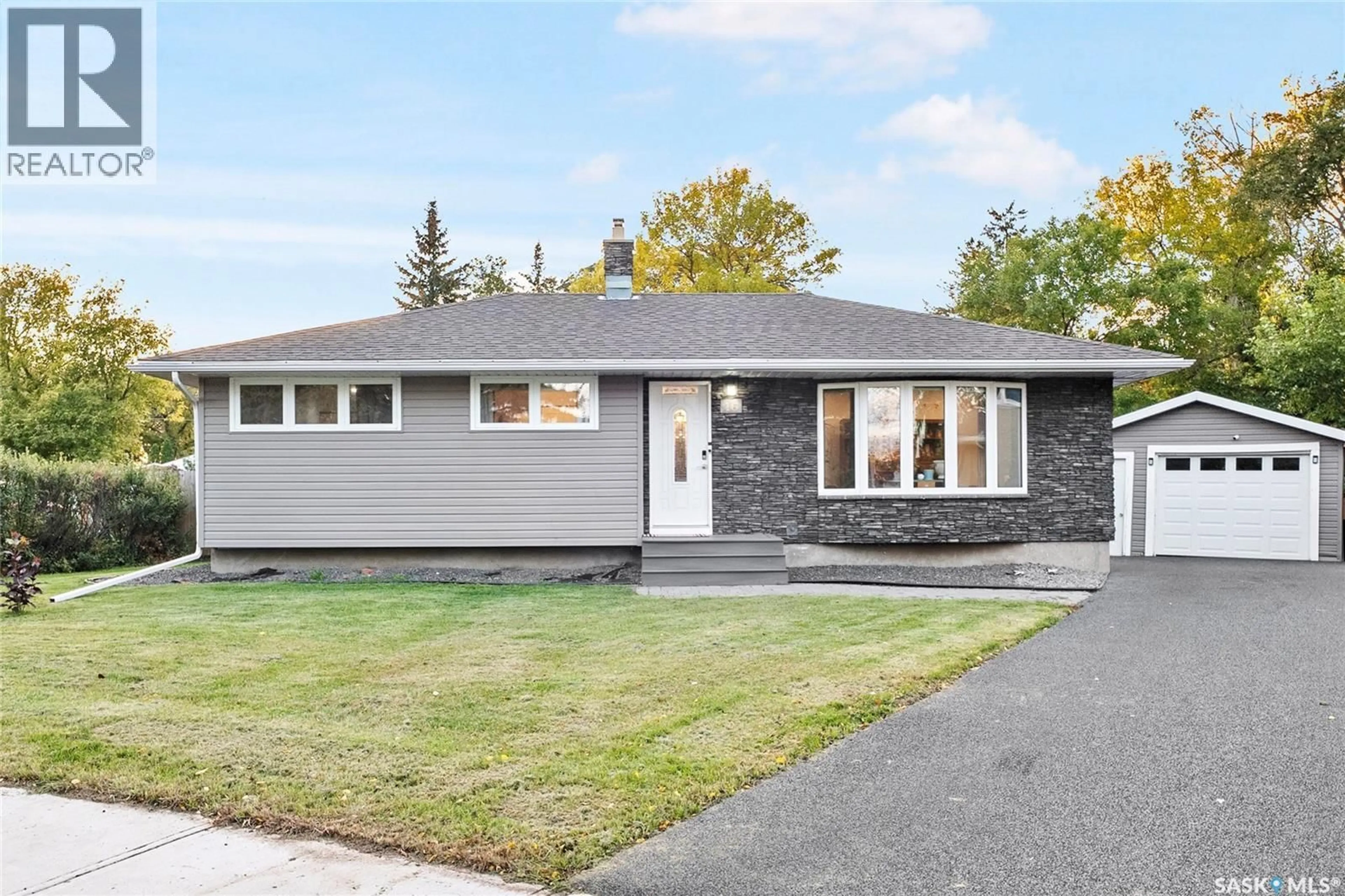Home with vinyl exterior material, street for 16 LIPTON PLACE, Regina Saskatchewan S4R3T6