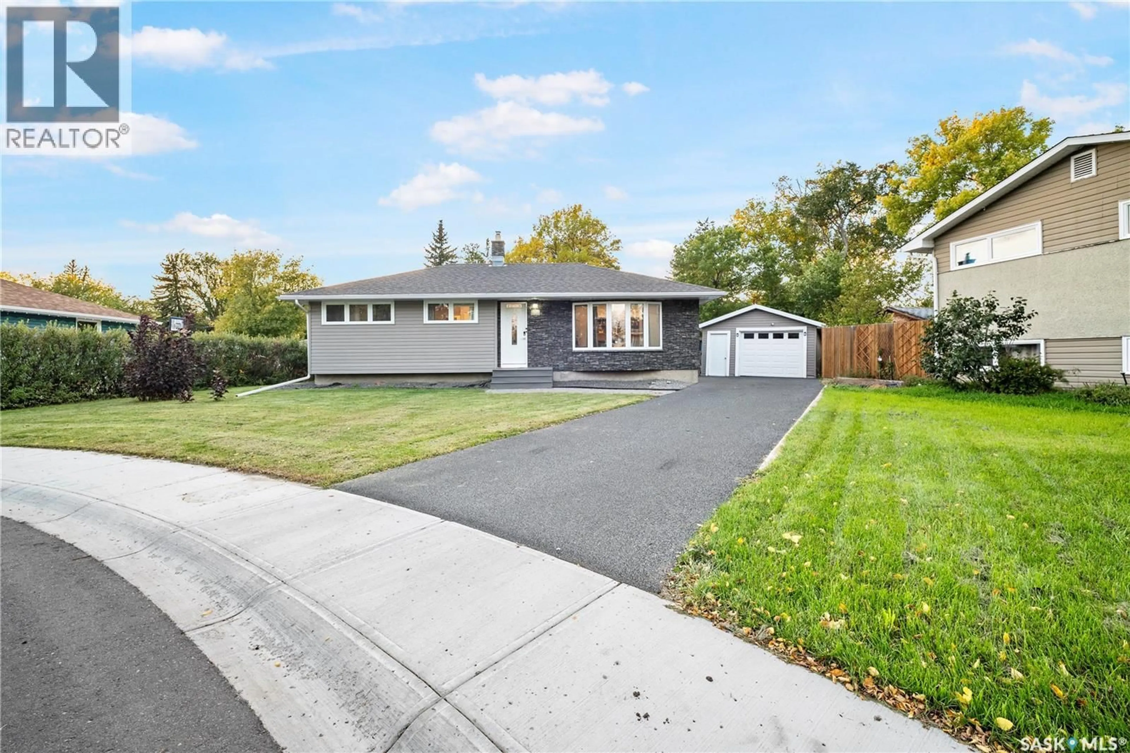 Home with vinyl exterior material, street for 16 LIPTON PLACE, Regina Saskatchewan S4R3T6