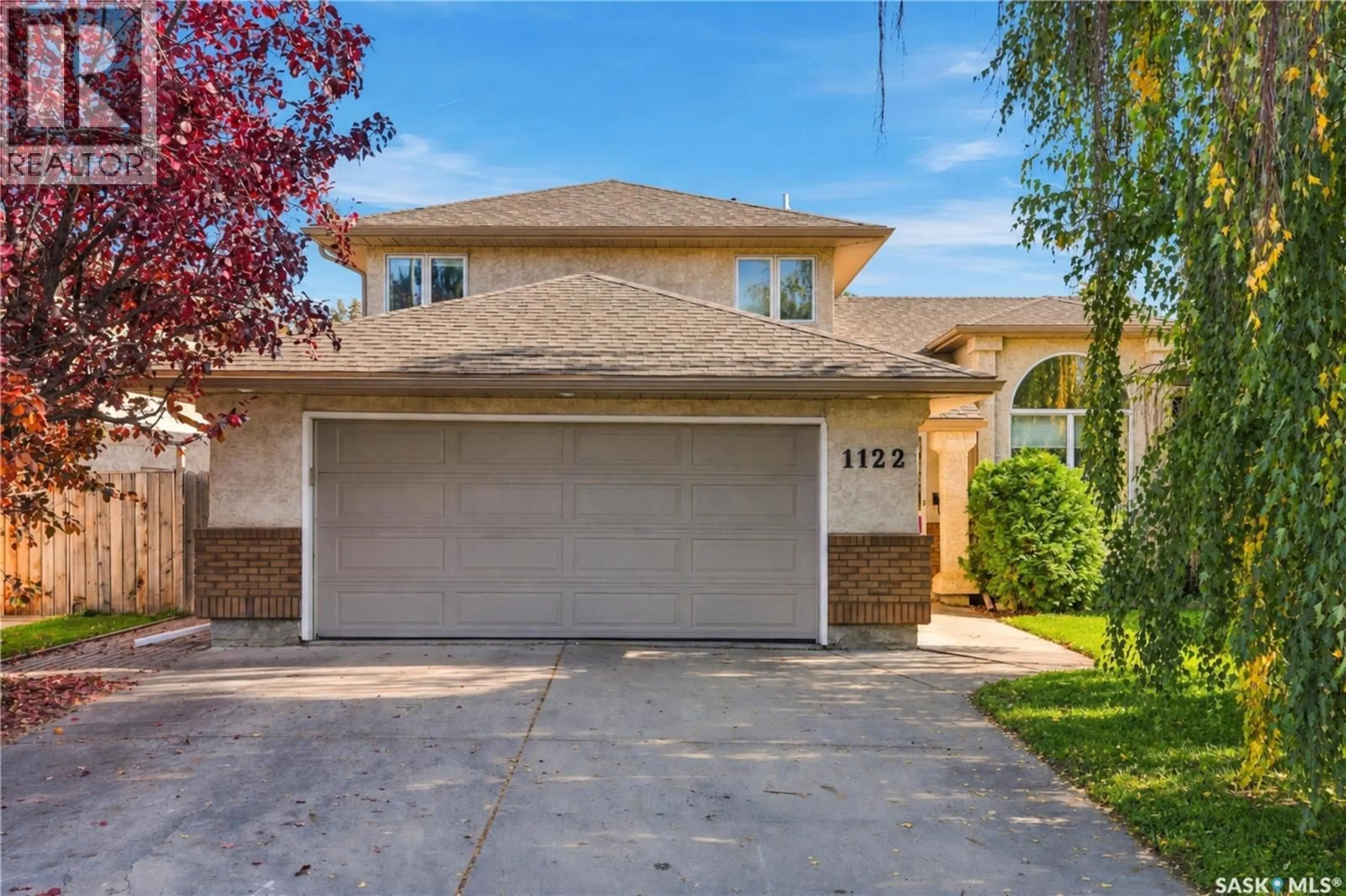 Home with brick exterior material, street for 1122 HURLEY WAY, Saskatoon Saskatchewan S7N4J7