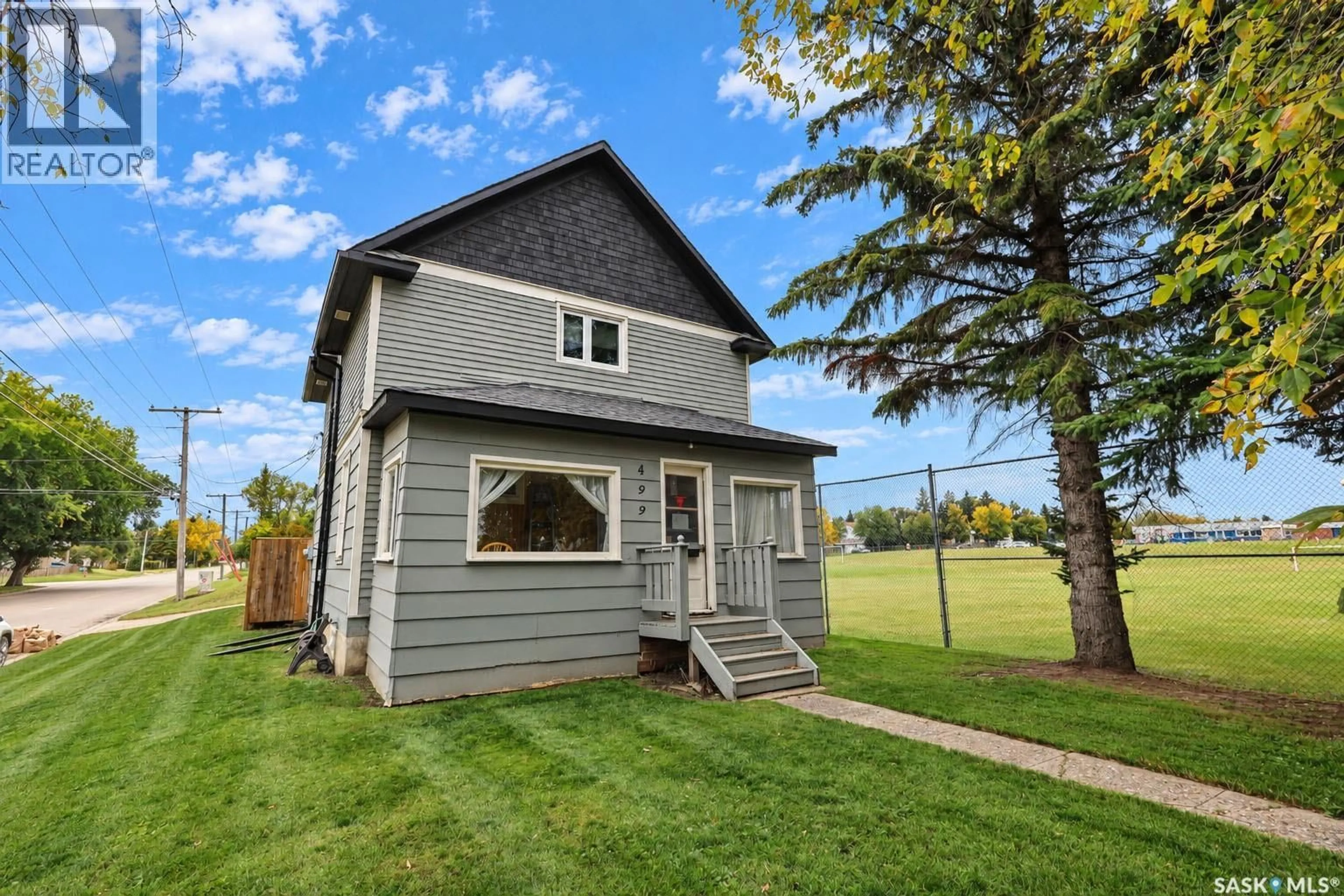Home with vinyl exterior material, street for 499 23RD STREET, Prince Albert Saskatchewan S6V1P9