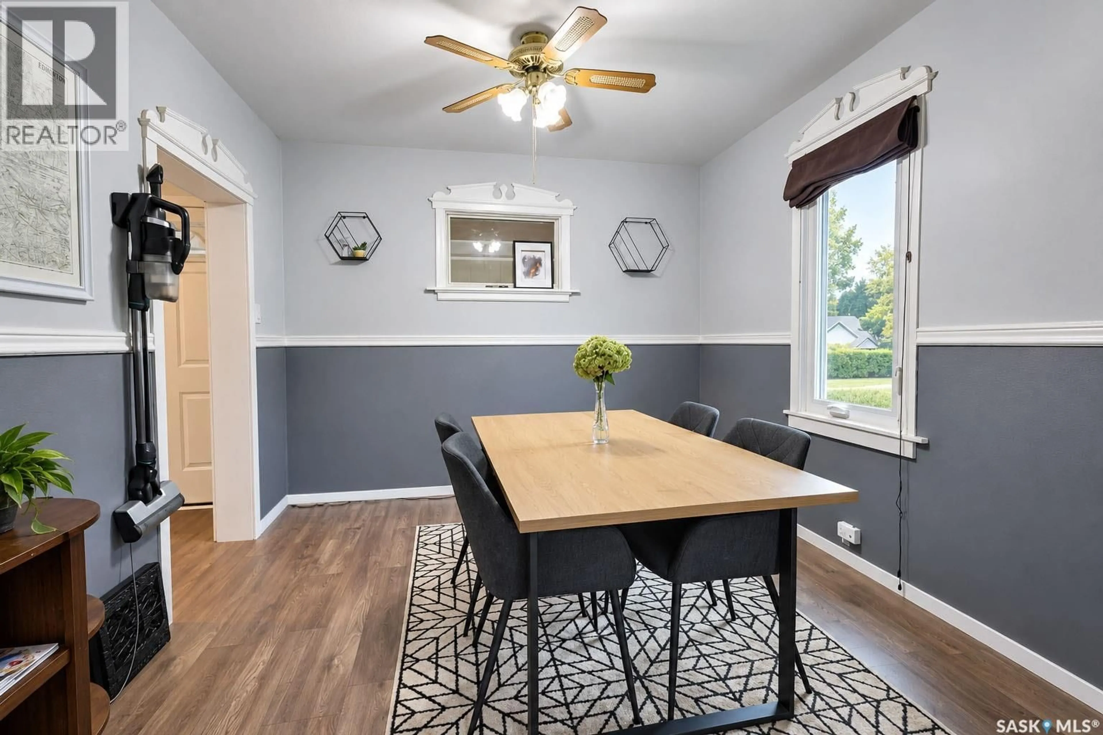 Dining room, wood/laminate floor for 499 23RD STREET, Prince Albert Saskatchewan S6V1P9