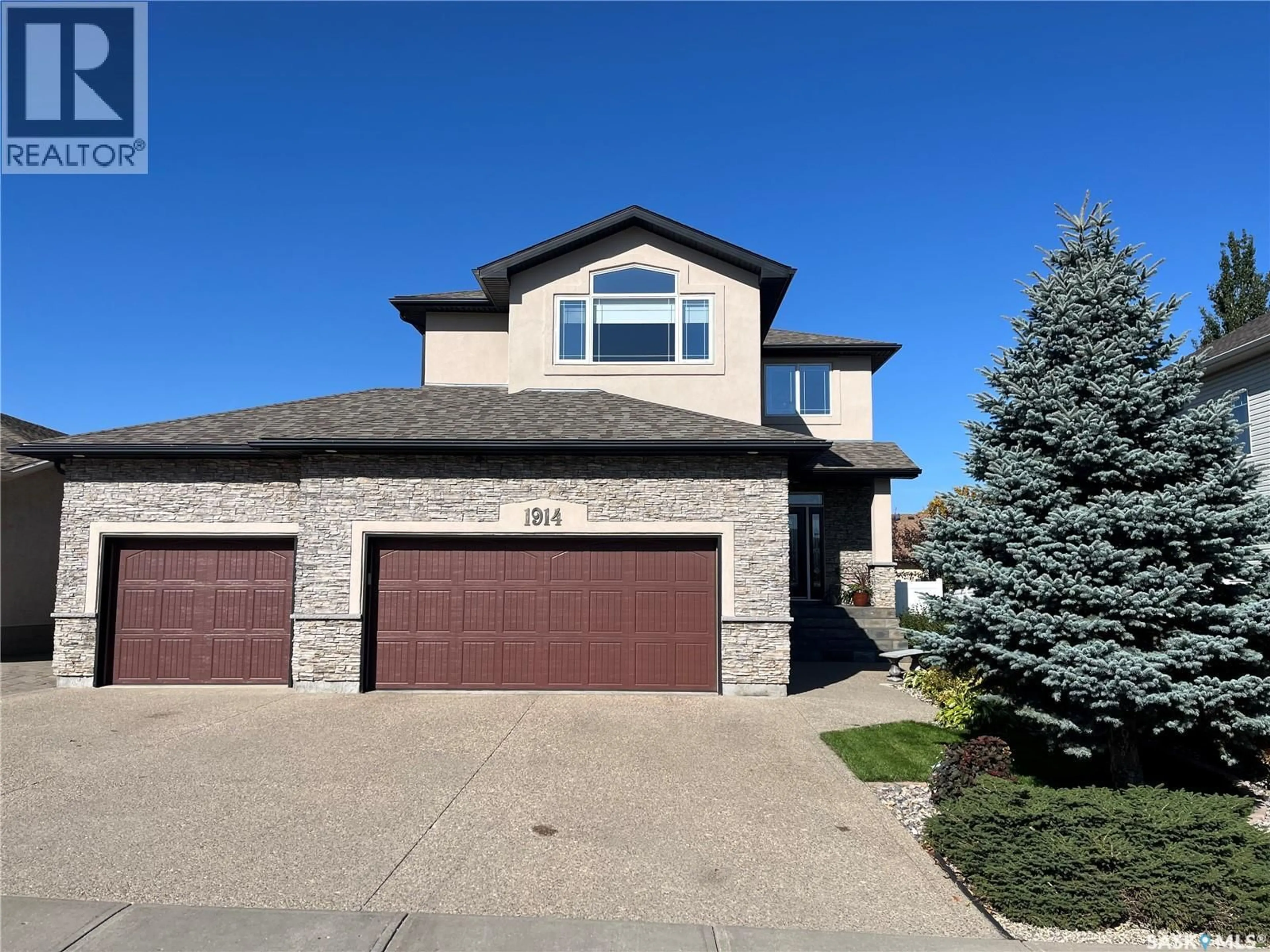 Home with brick exterior material, street for 1914 LAURIER CRESCENT, Regina Saskatchewan S4V0N8