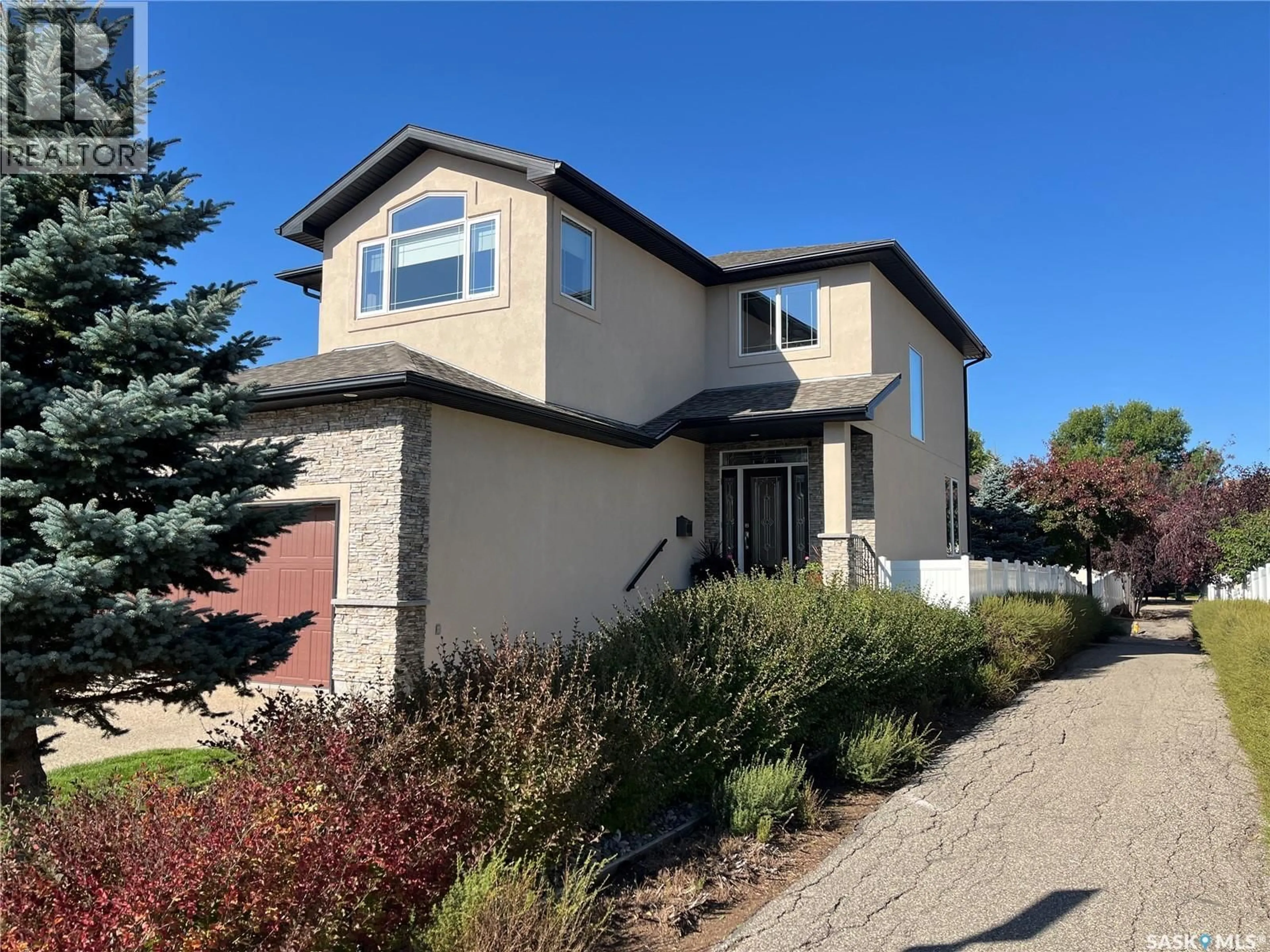 Home with brick exterior material, street for 1914 LAURIER CRESCENT, Regina Saskatchewan S4V0N8