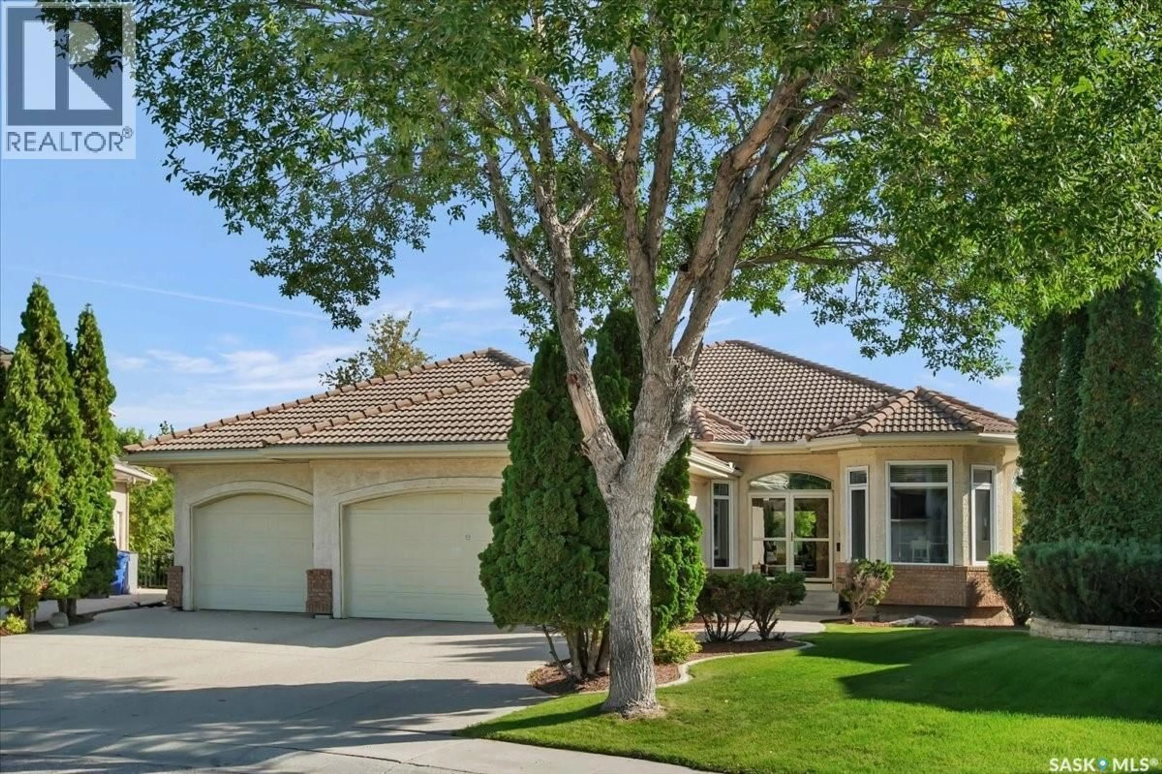 Home with vinyl exterior material, street for 322 COLLINS CRESCENT, Saskatoon Saskatchewan S7N4K7