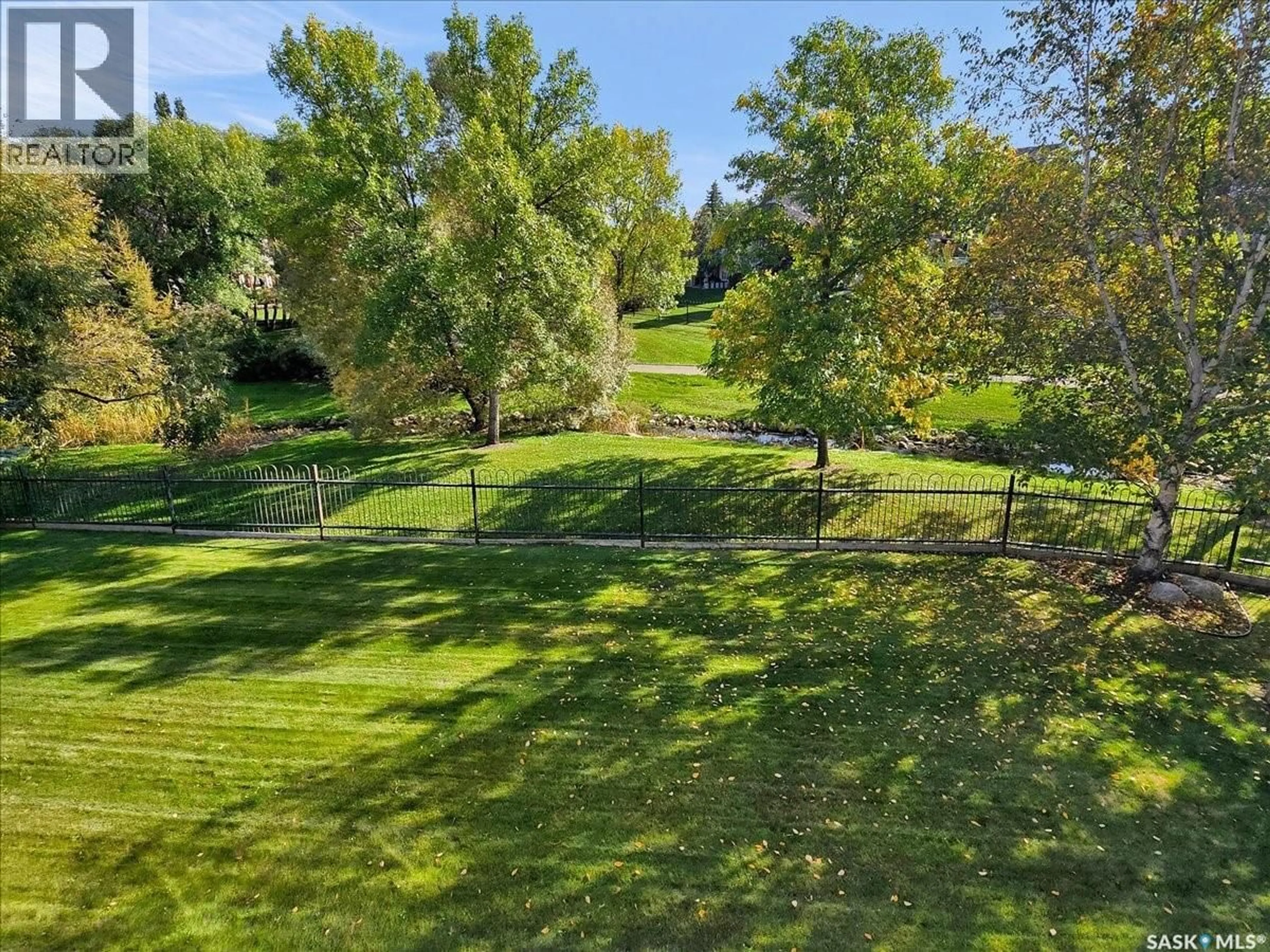A pic from outside/outdoor area/front of a property/back of a property/a pic from drone, forest/trees view for 322 COLLINS CRESCENT, Saskatoon Saskatchewan S7N4K7