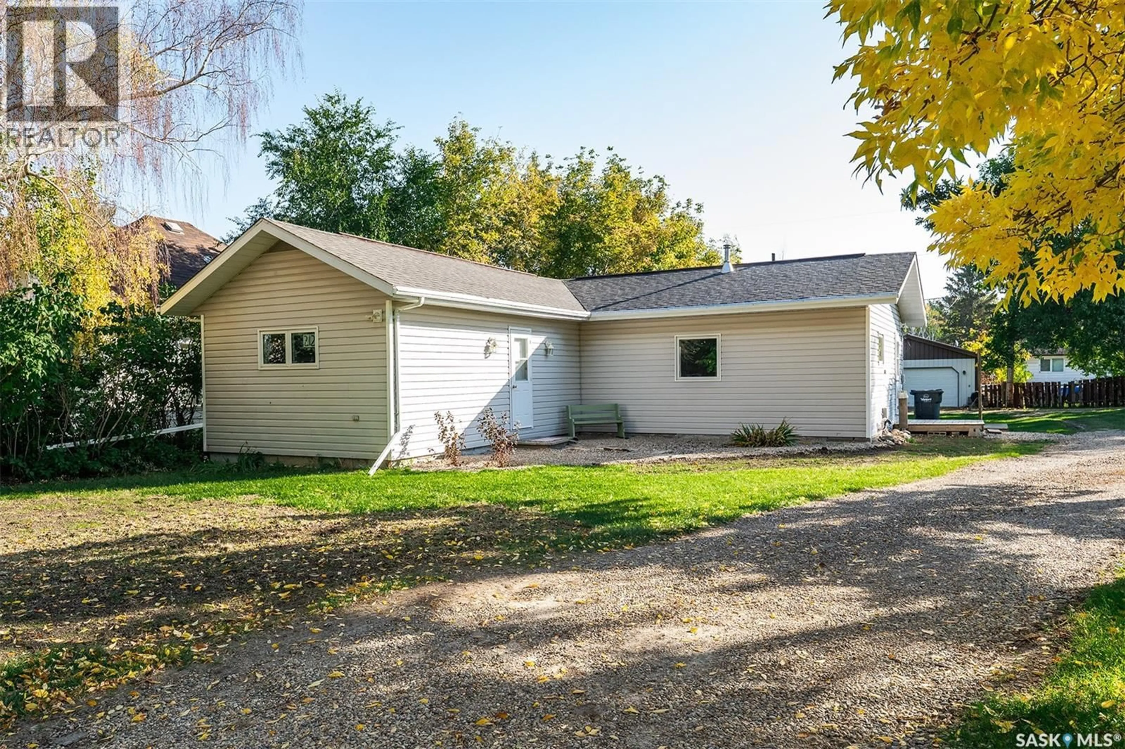 A pic from outside/outdoor area/front of a property/back of a property/a pic from drone, street for E - 212 5TH STREET, Wynyard Saskatchewan S0A4T0