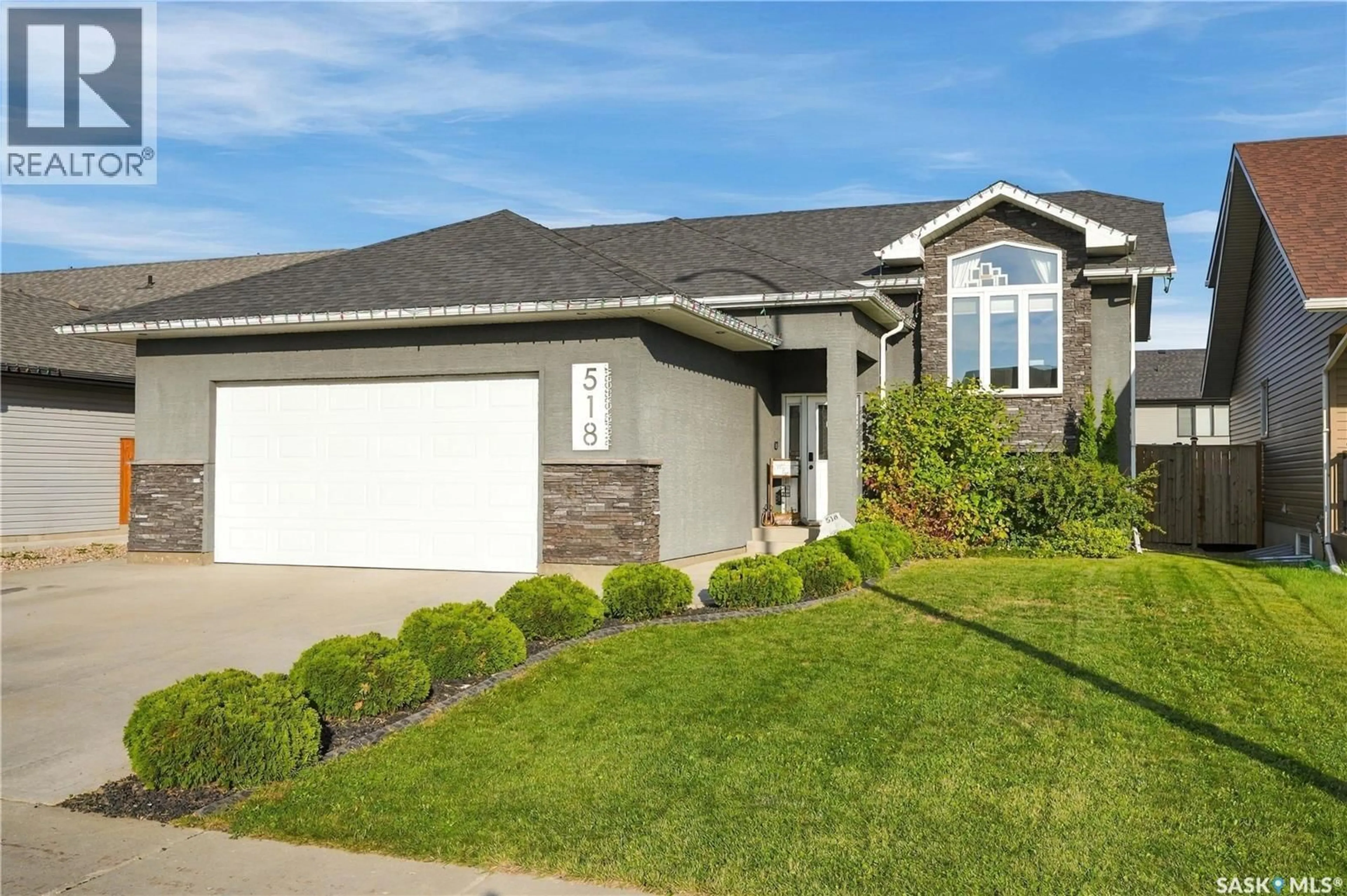 Home with vinyl exterior material, street for 518 PALMER CRESCENT, Warman Saskatchewan S0K4S1