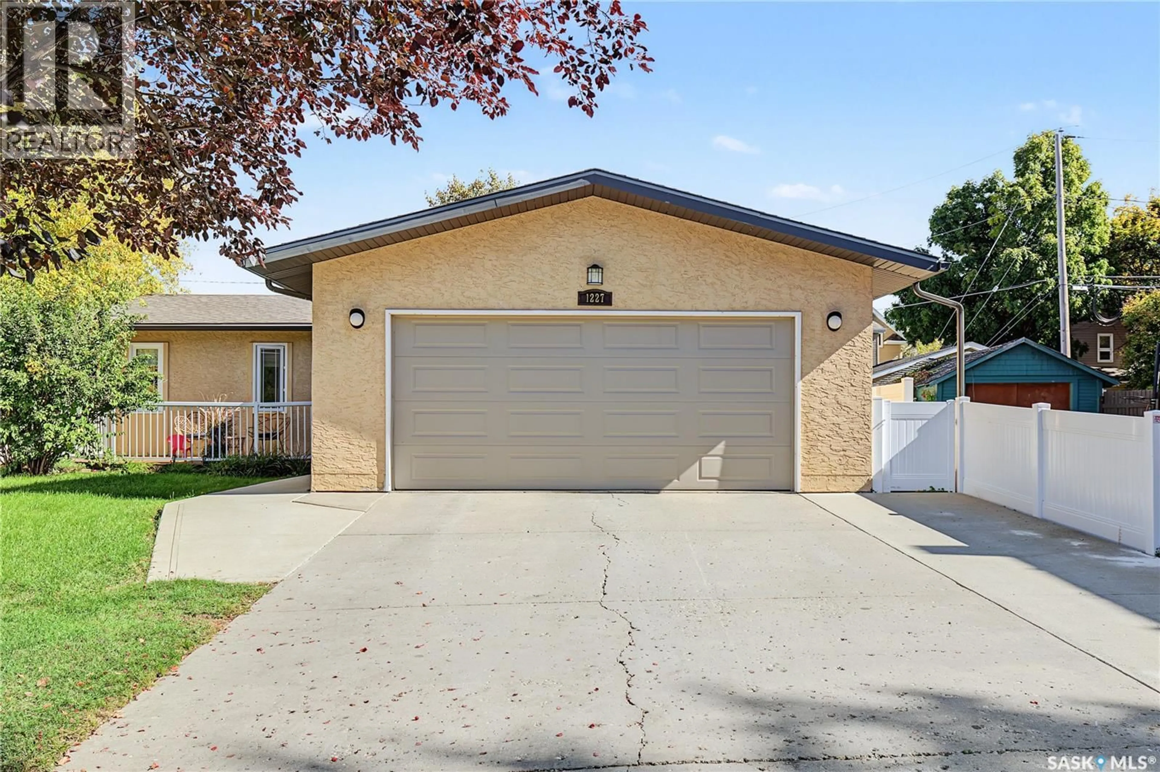 Home with vinyl exterior material, street for 1227 2ND AVENUE, Moose Jaw Saskatchewan S6H3R6