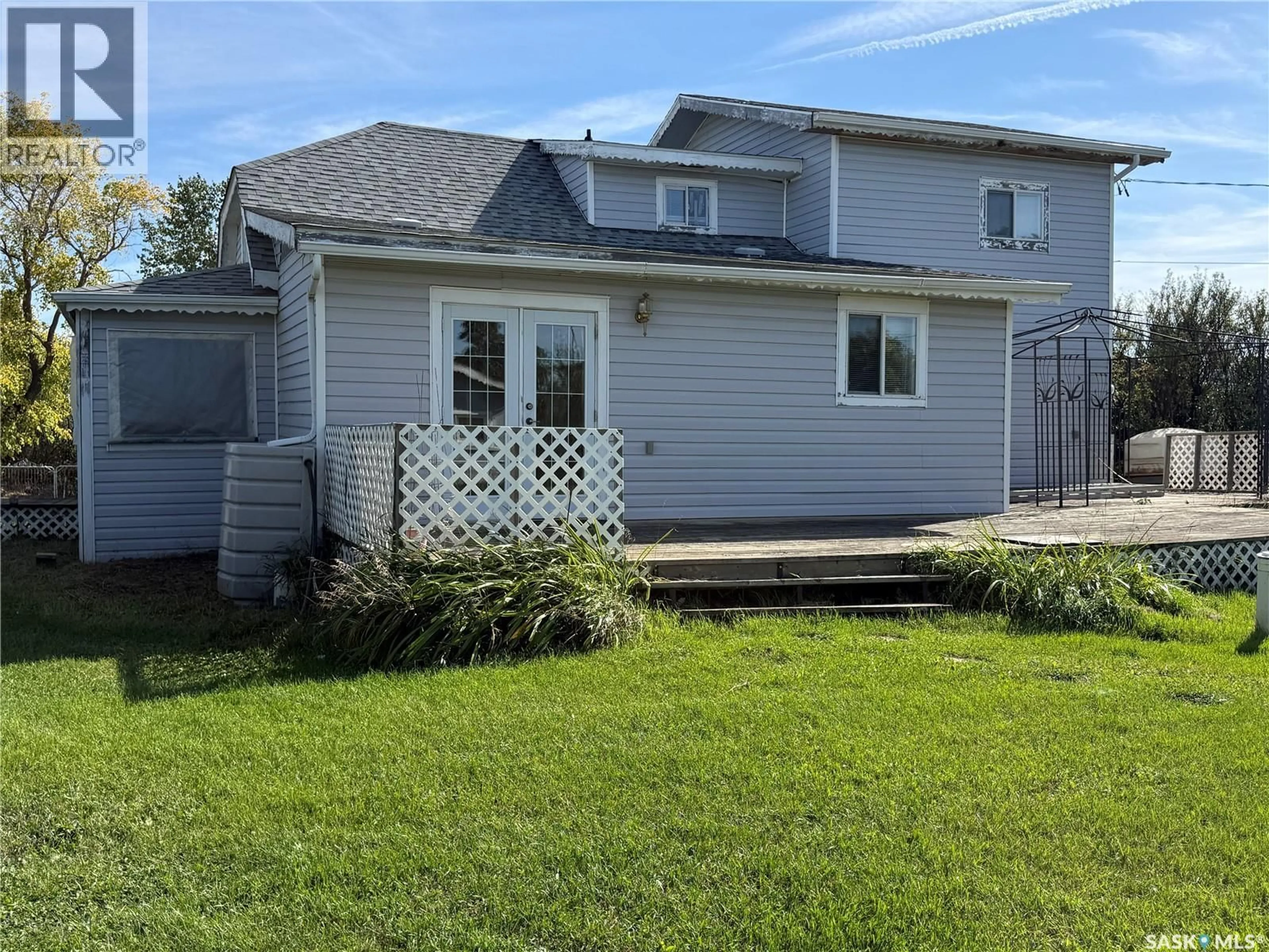 Home with vinyl exterior material, street for 7 1ST AVENUE, Elmsthorpe Rm No. 100 Saskatchewan S0H4A0