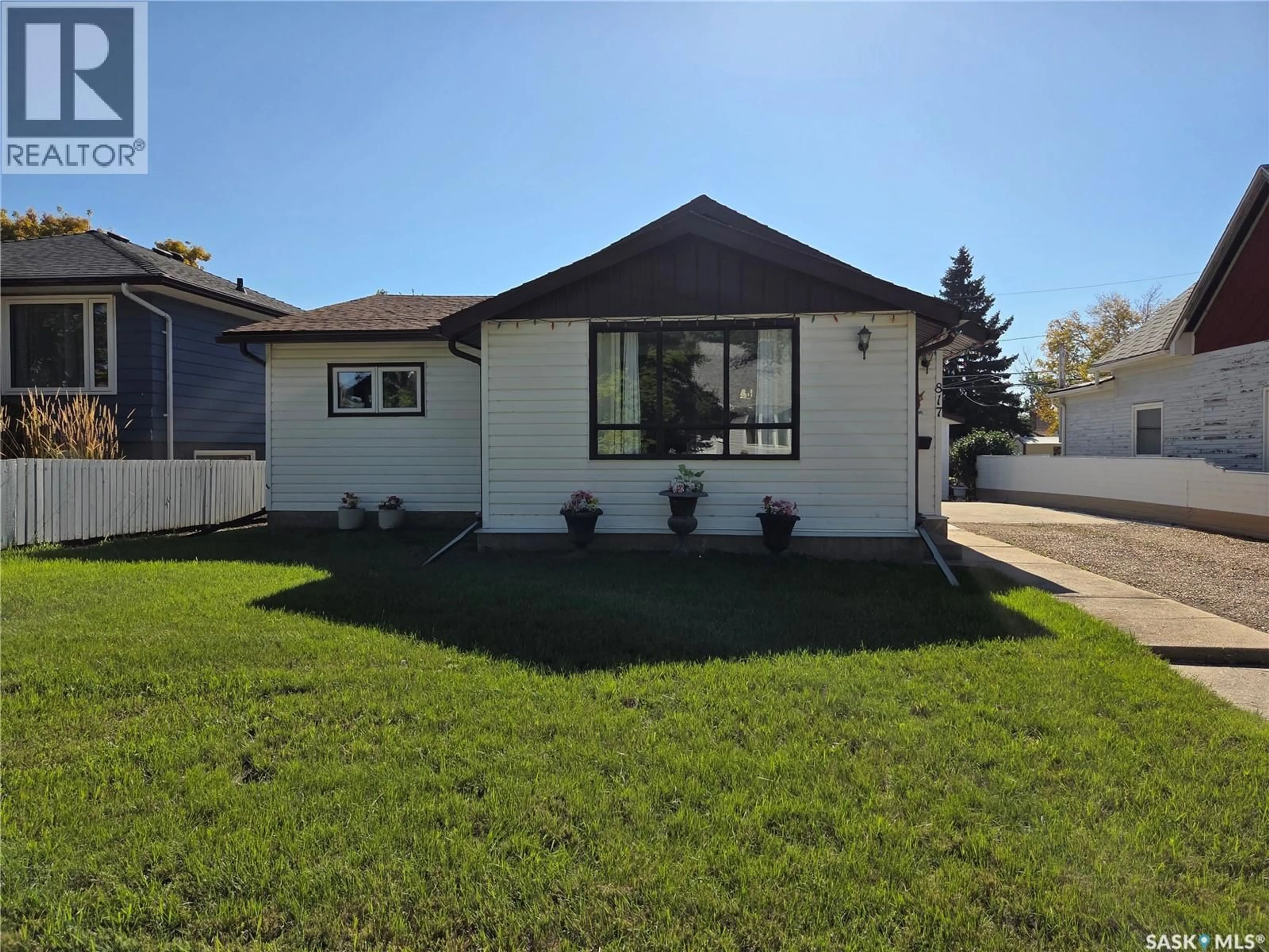 Home with vinyl exterior material, street for 817 STADACONA STREET, Moose Jaw Saskatchewan S6H0K5