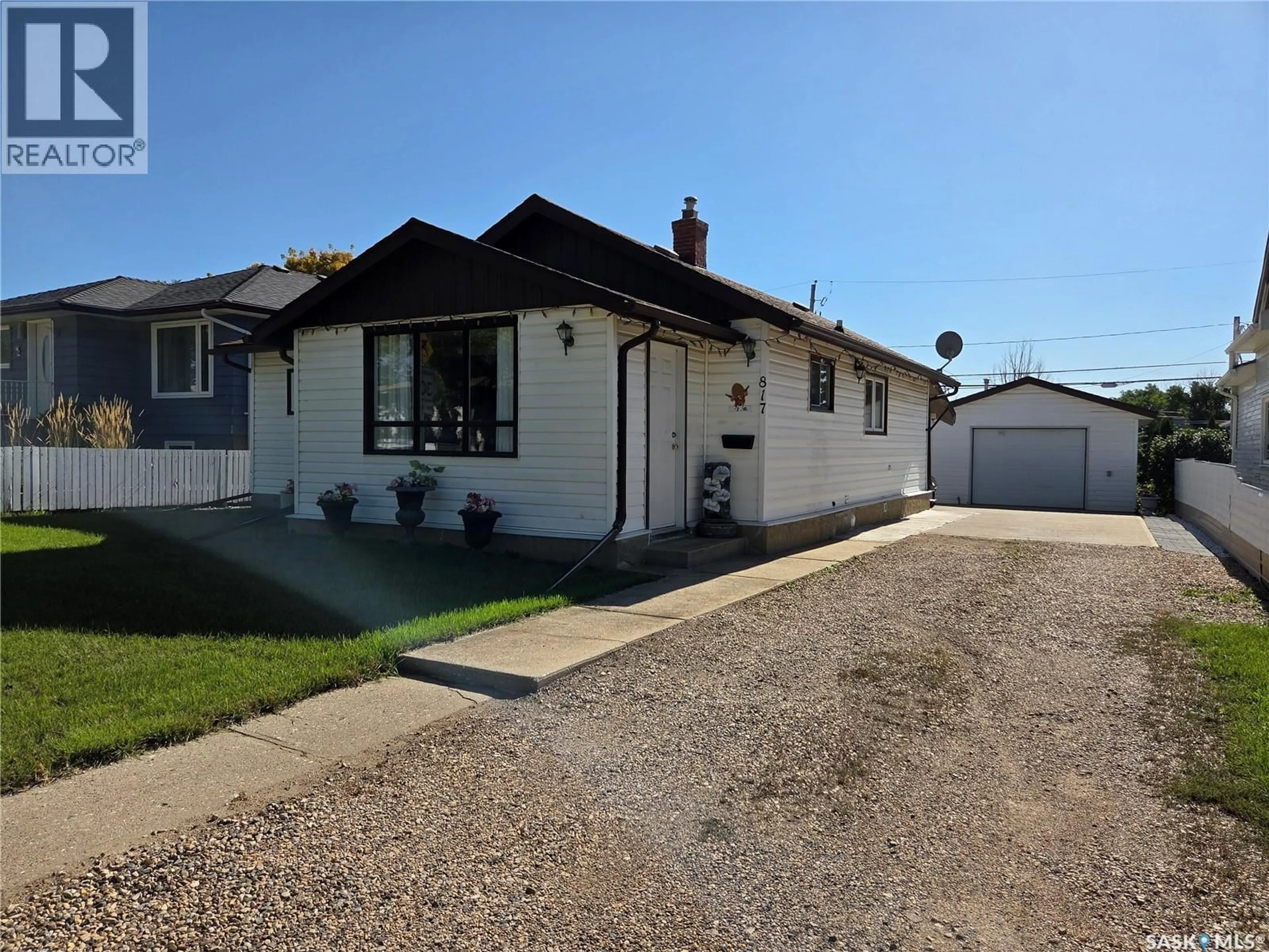 A pic from outside/outdoor area/front of a property/back of a property/a pic from drone, street for 817 STADACONA STREET, Moose Jaw Saskatchewan S6H0K5