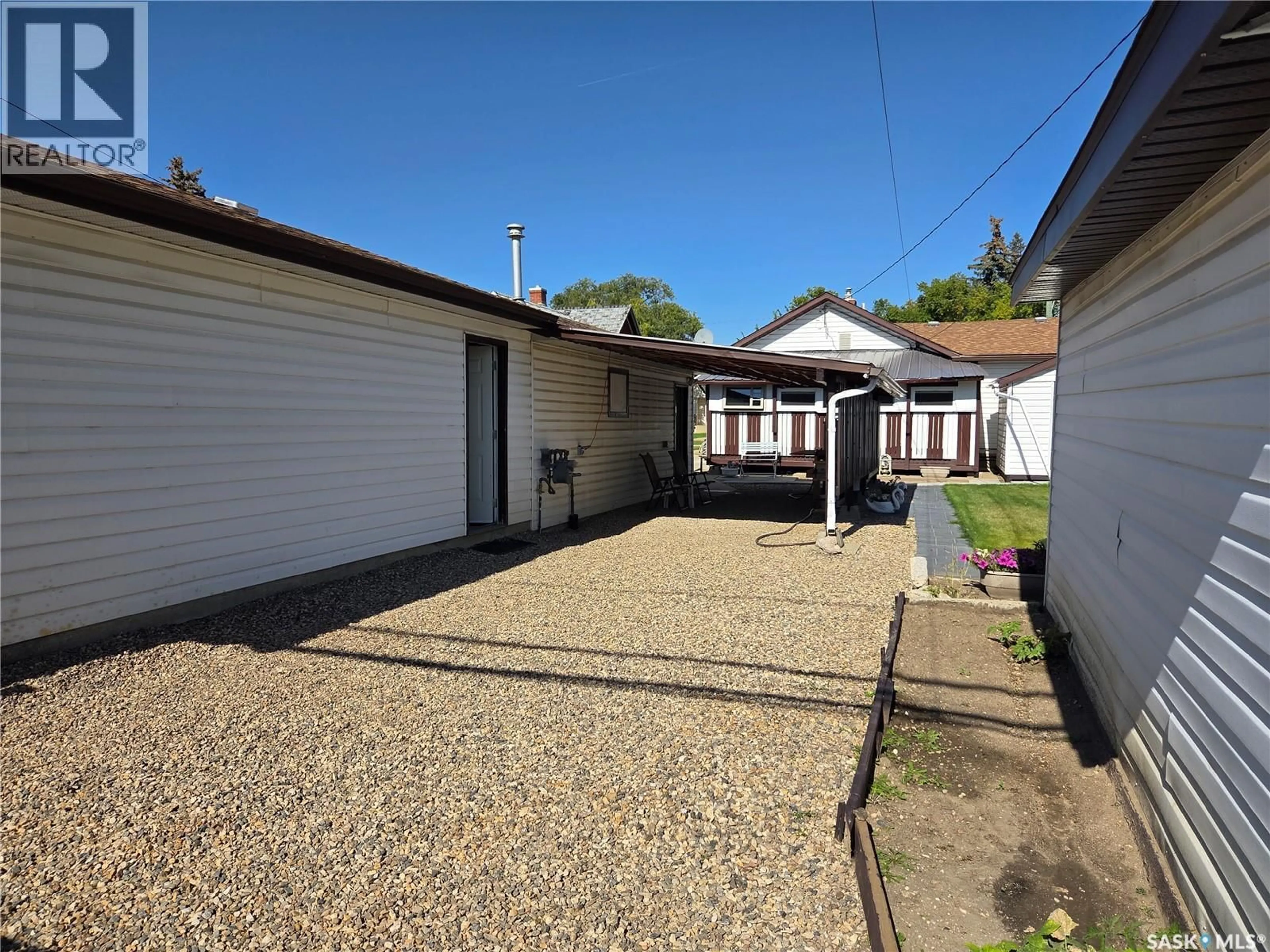 A pic from outside/outdoor area/front of a property/back of a property/a pic from drone, street for 817 STADACONA STREET, Moose Jaw Saskatchewan S6H0K5