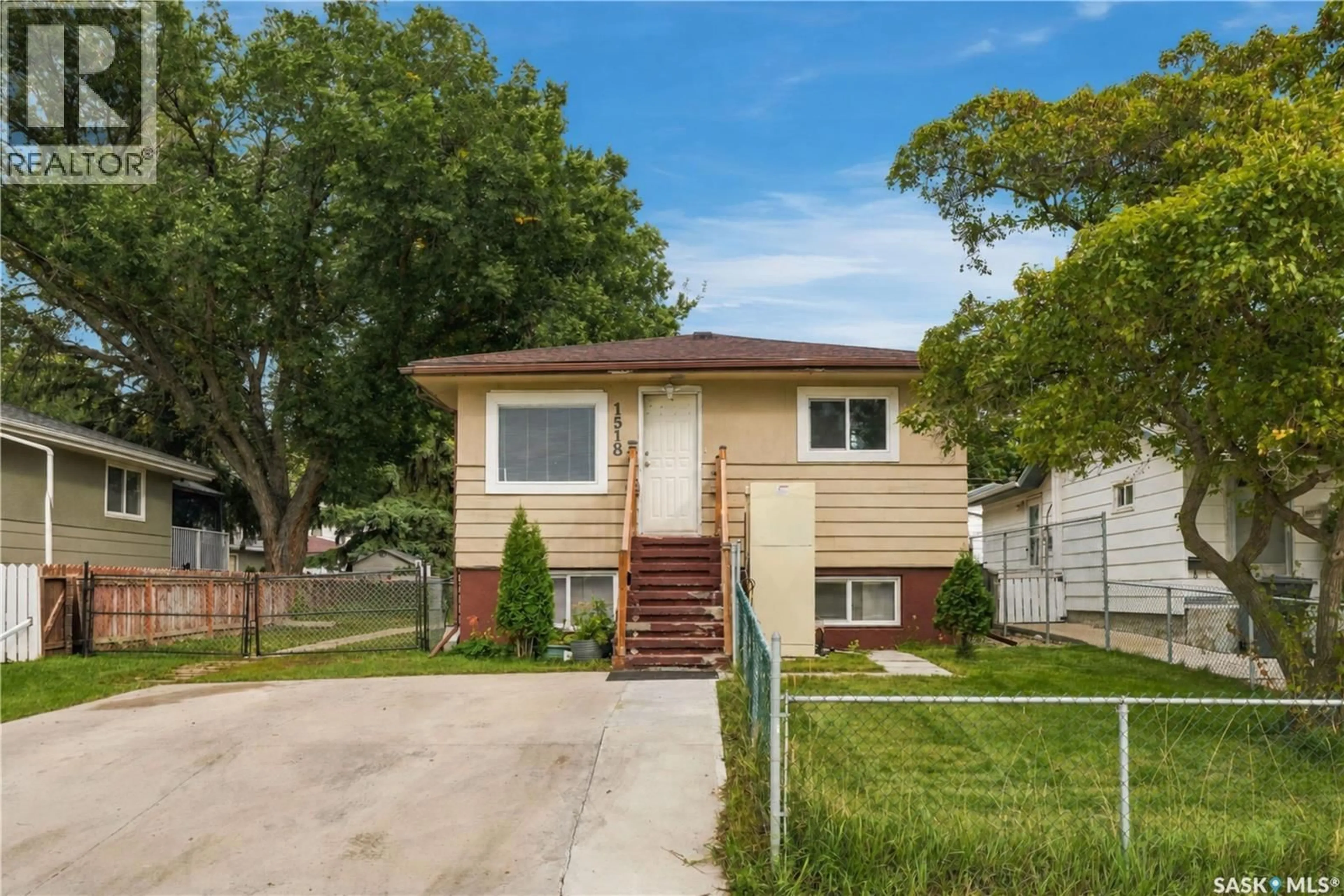 Home with vinyl exterior material, street for 1518 I AVENUE, Saskatoon Saskatchewan S7L2J6
