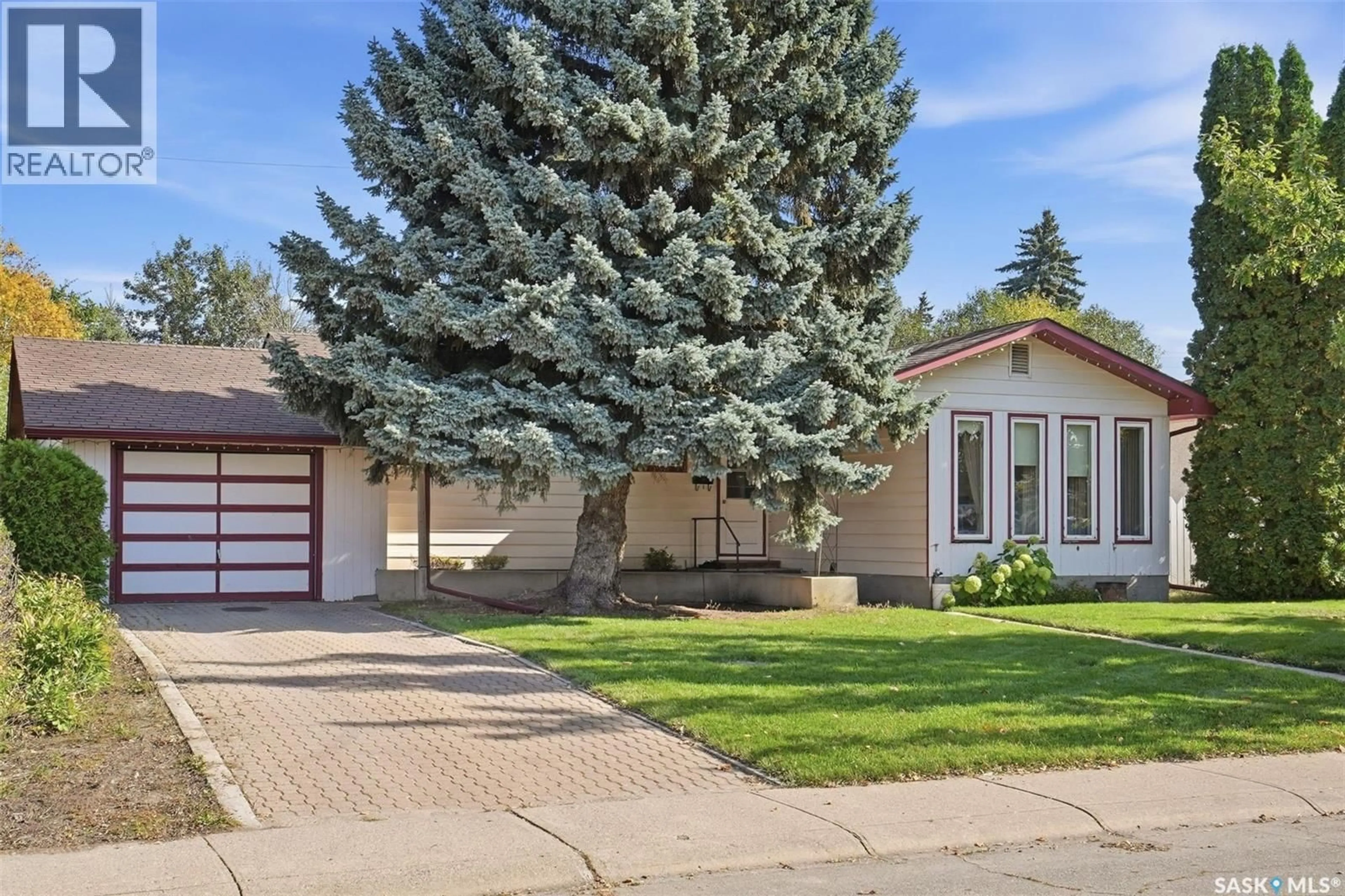 Home with vinyl exterior material, street for 219 EGBERT AVENUE, Saskatoon Saskatchewan S7N1X2