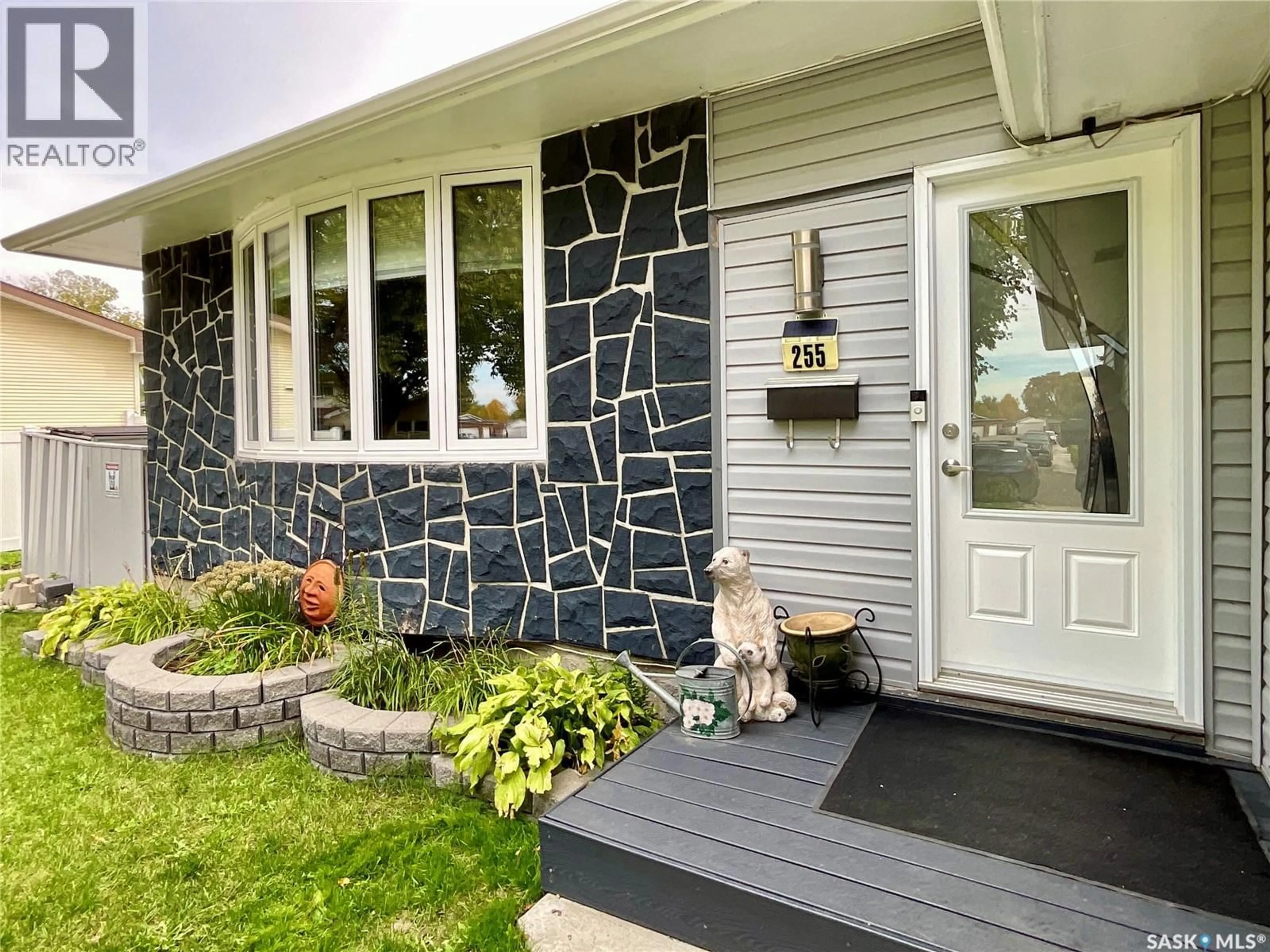 Home with vinyl exterior material, street for 255 LITZENBERGER CRESCENT, Regina Saskatchewan S4R7A2
