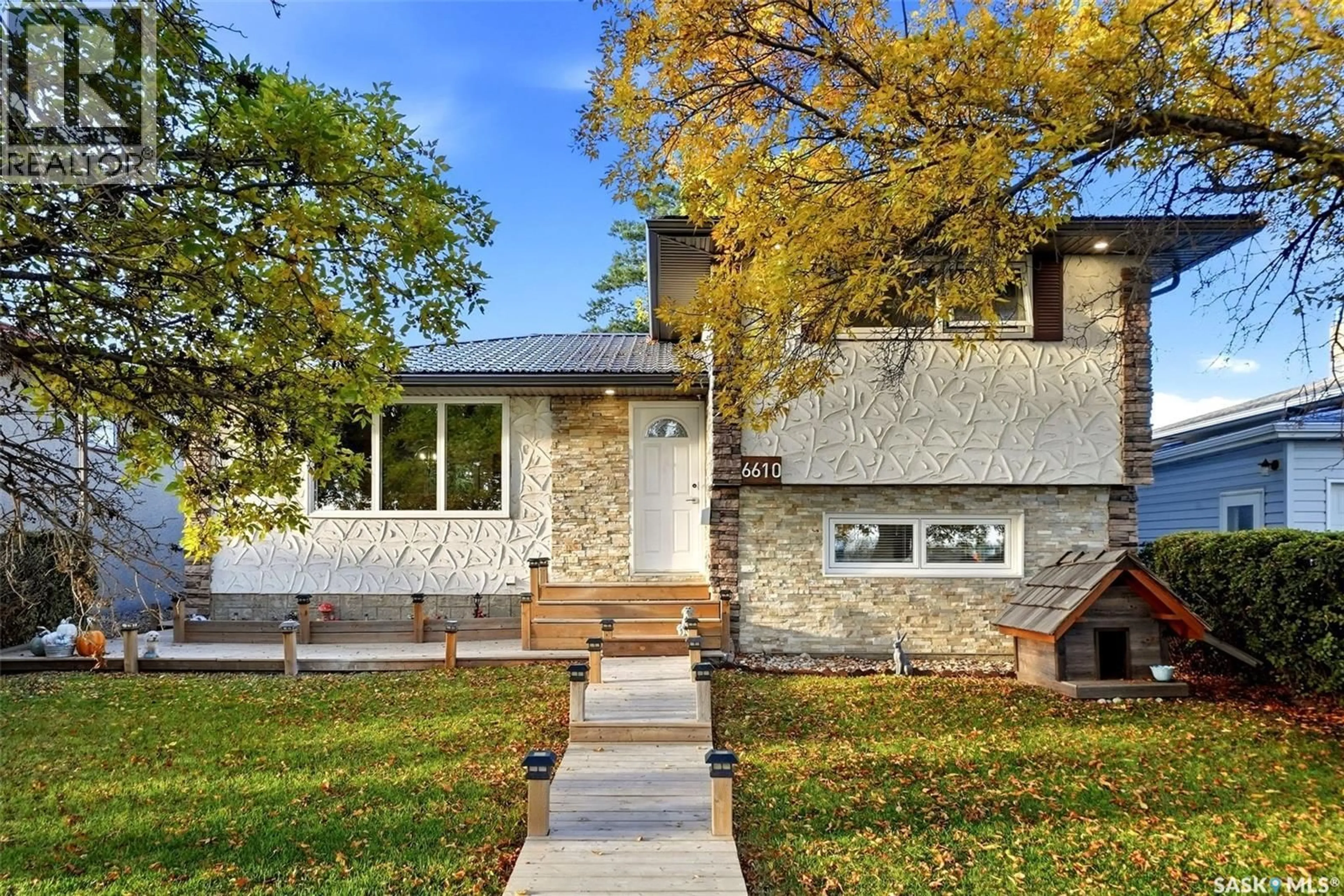 Home with brick exterior material, street for 6610 DEWDNEY AVENUE, Regina Saskatchewan S4T6W7