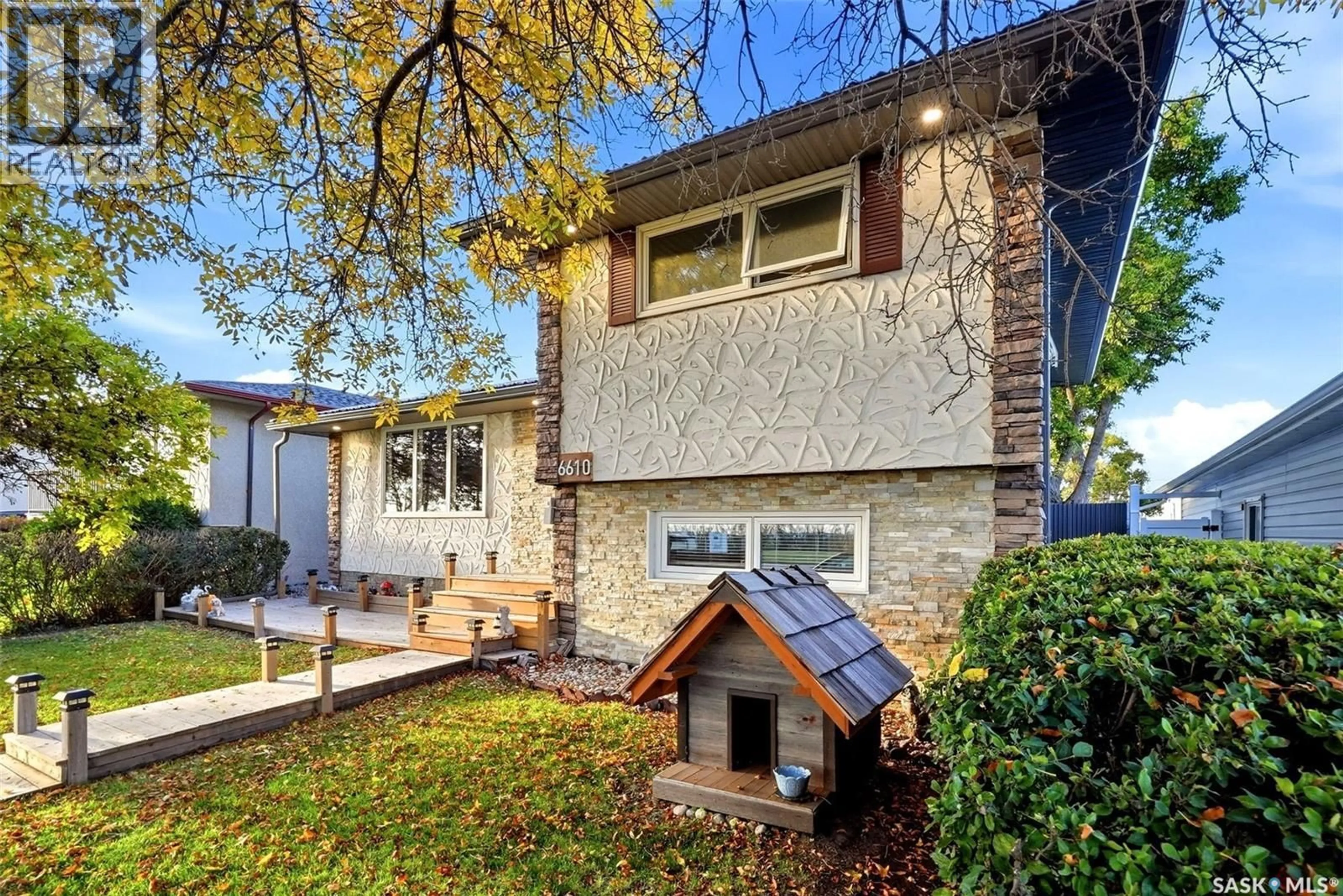 Home with brick exterior material, street for 6610 DEWDNEY AVENUE, Regina Saskatchewan S4T6W7