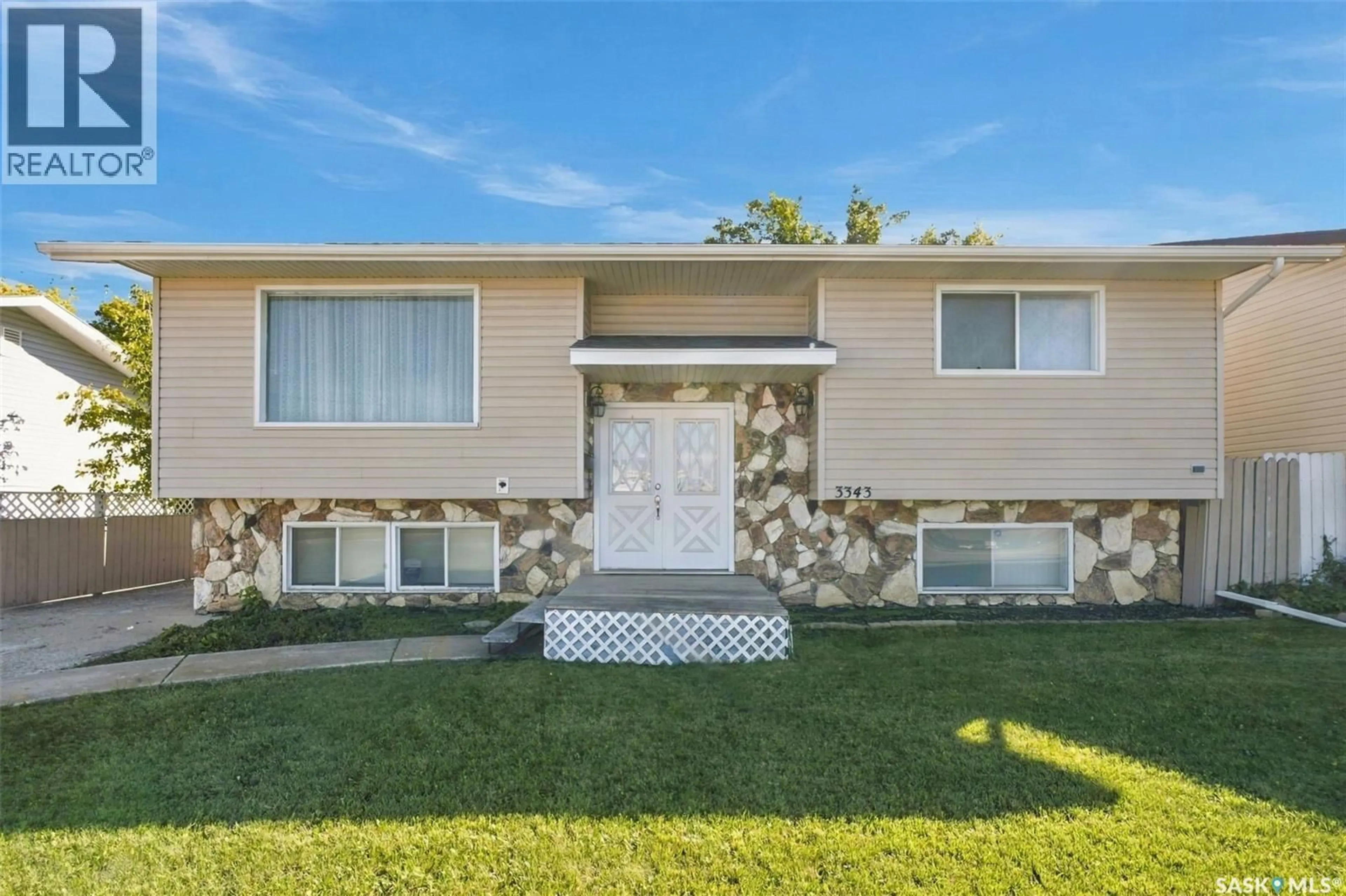 Home with vinyl exterior material, street for 3343 FAIRLIGHT DRIVE, Saskatoon Saskatchewan S7M4N1