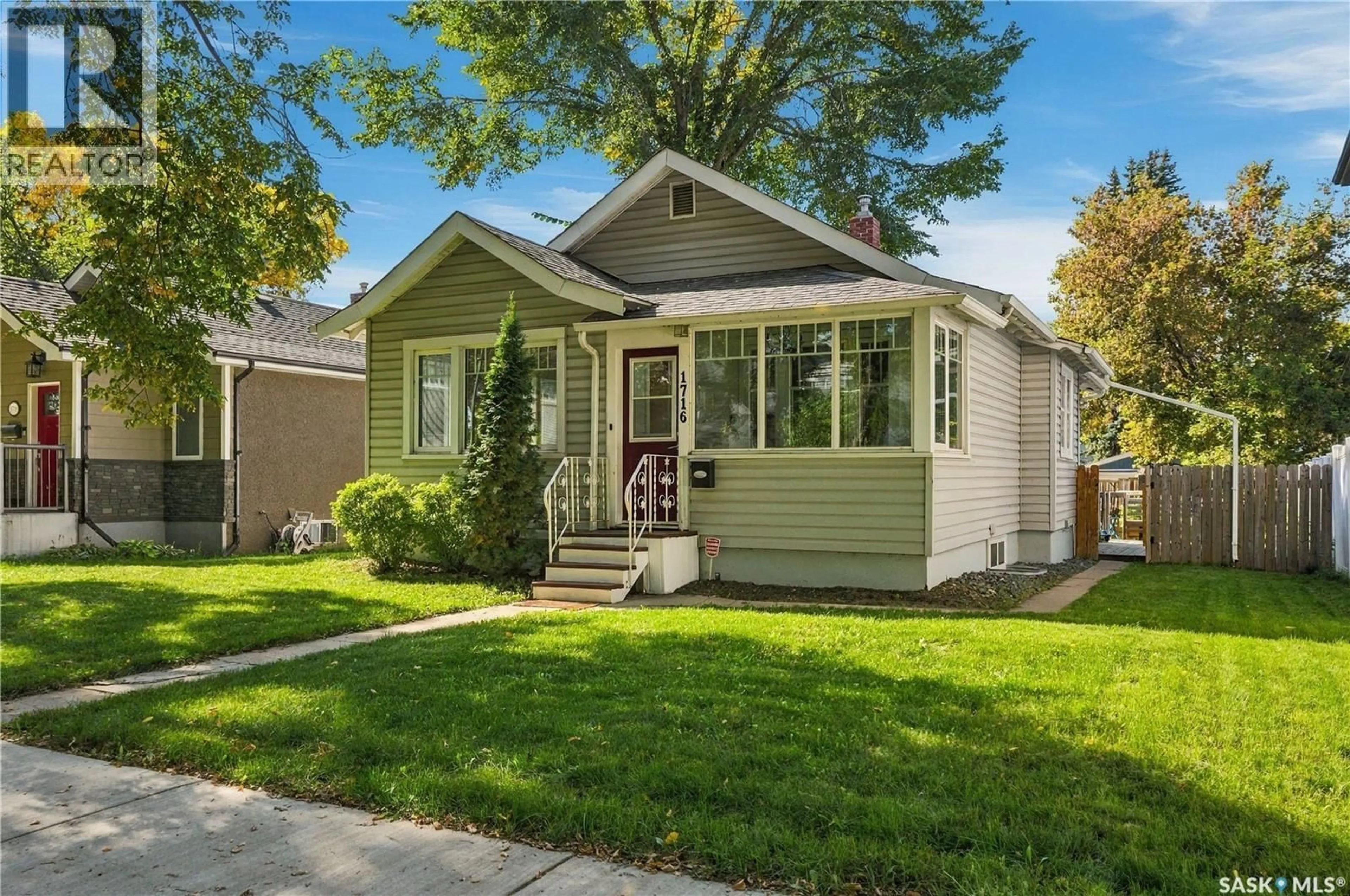 Home with vinyl exterior material, street for 1716 LORNE AVENUE, Saskatoon Saskatchewan S7H1Y4