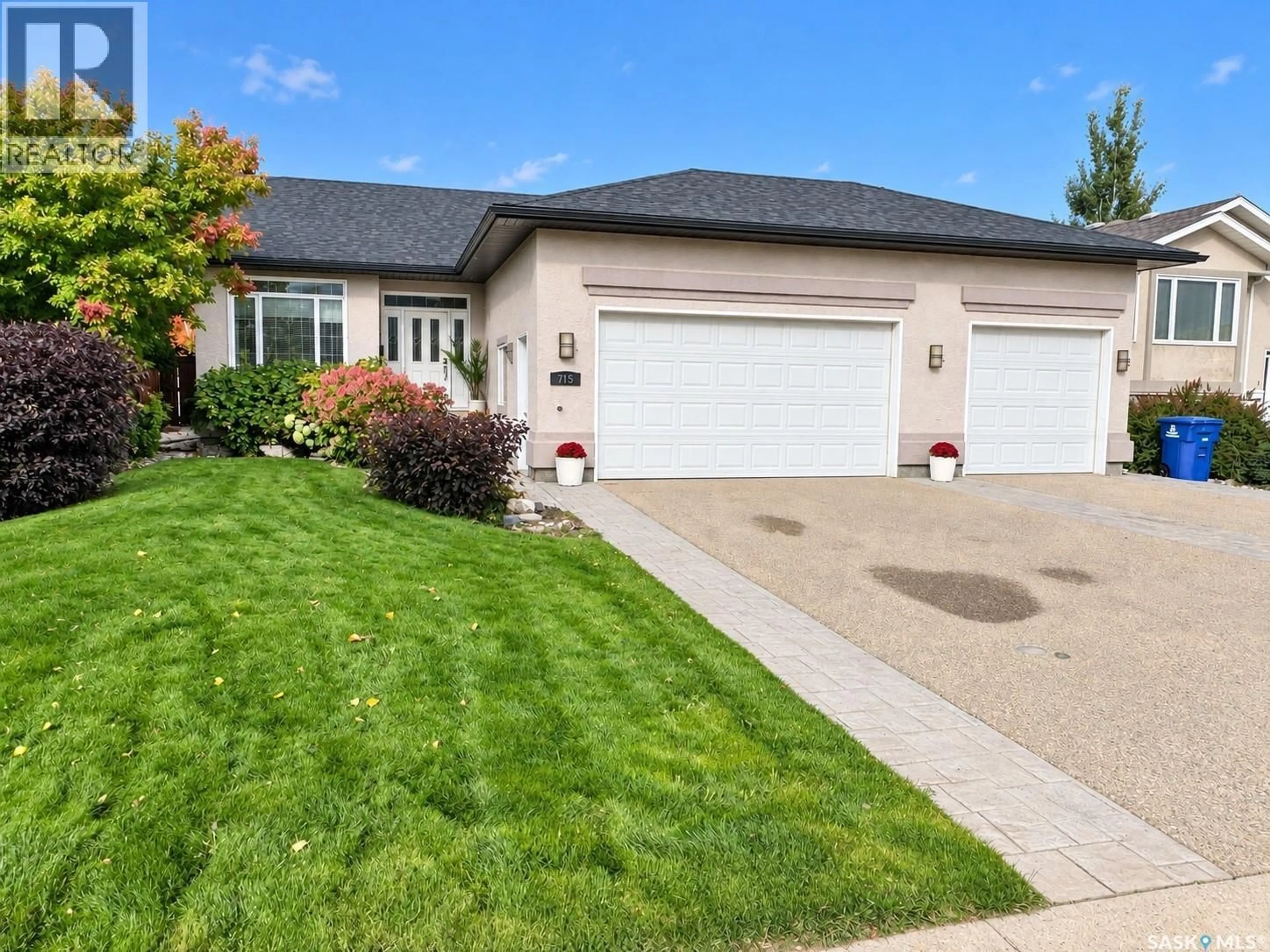 Home with vinyl exterior material, street for 715 18TH STREET, Weyburn Saskatchewan S4H3M2