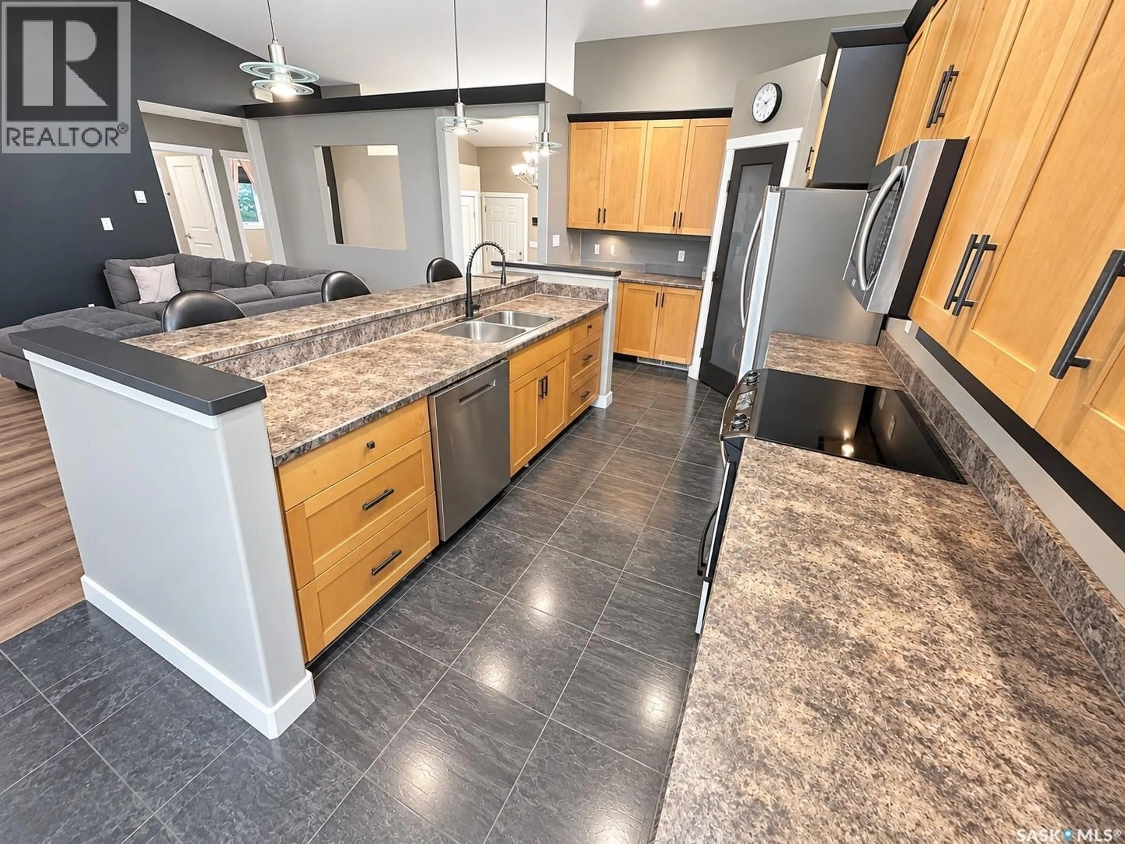 Contemporary kitchen, ceramic/tile floor for 715 18TH STREET, Weyburn Saskatchewan S4H3M2