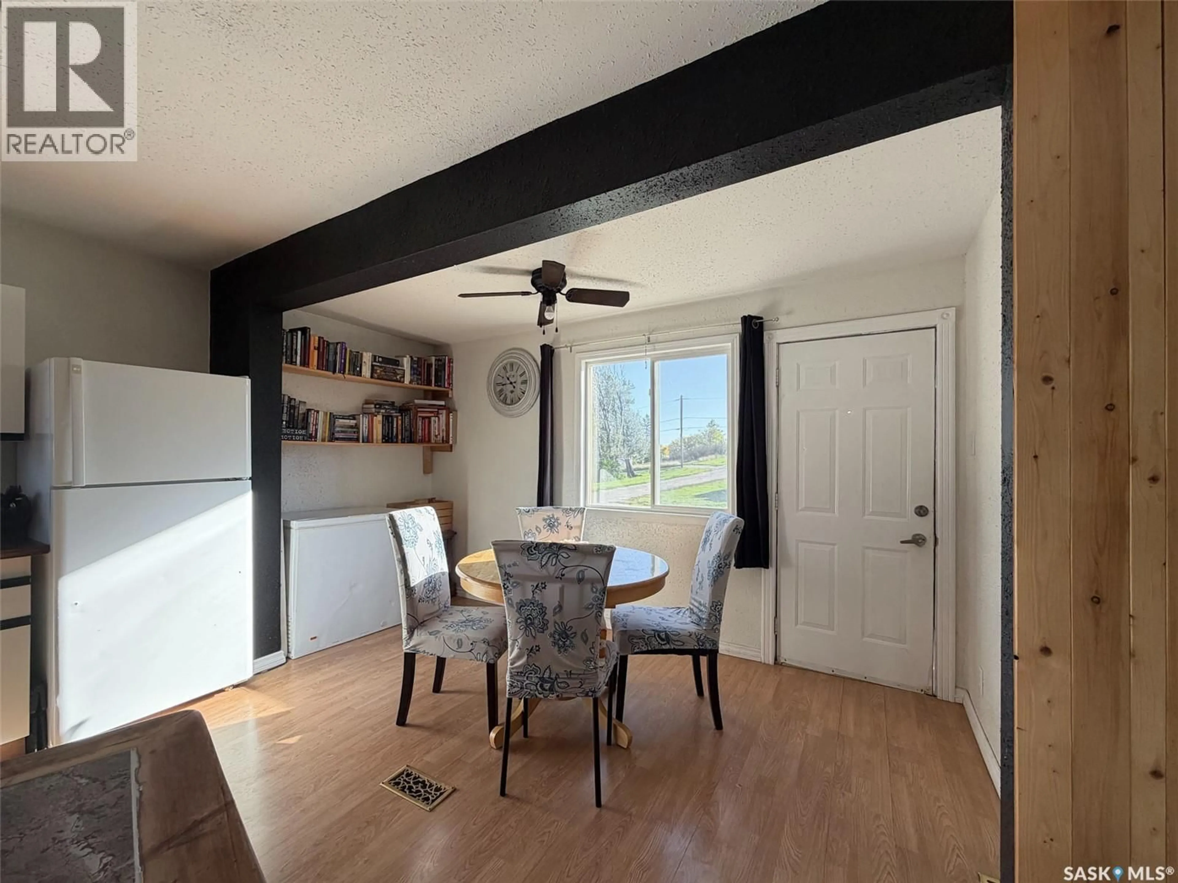 Dining room, wood/laminate floor for 50 SHAUGHNESSY STREET, Tompkins Saskatchewan S0N2S0