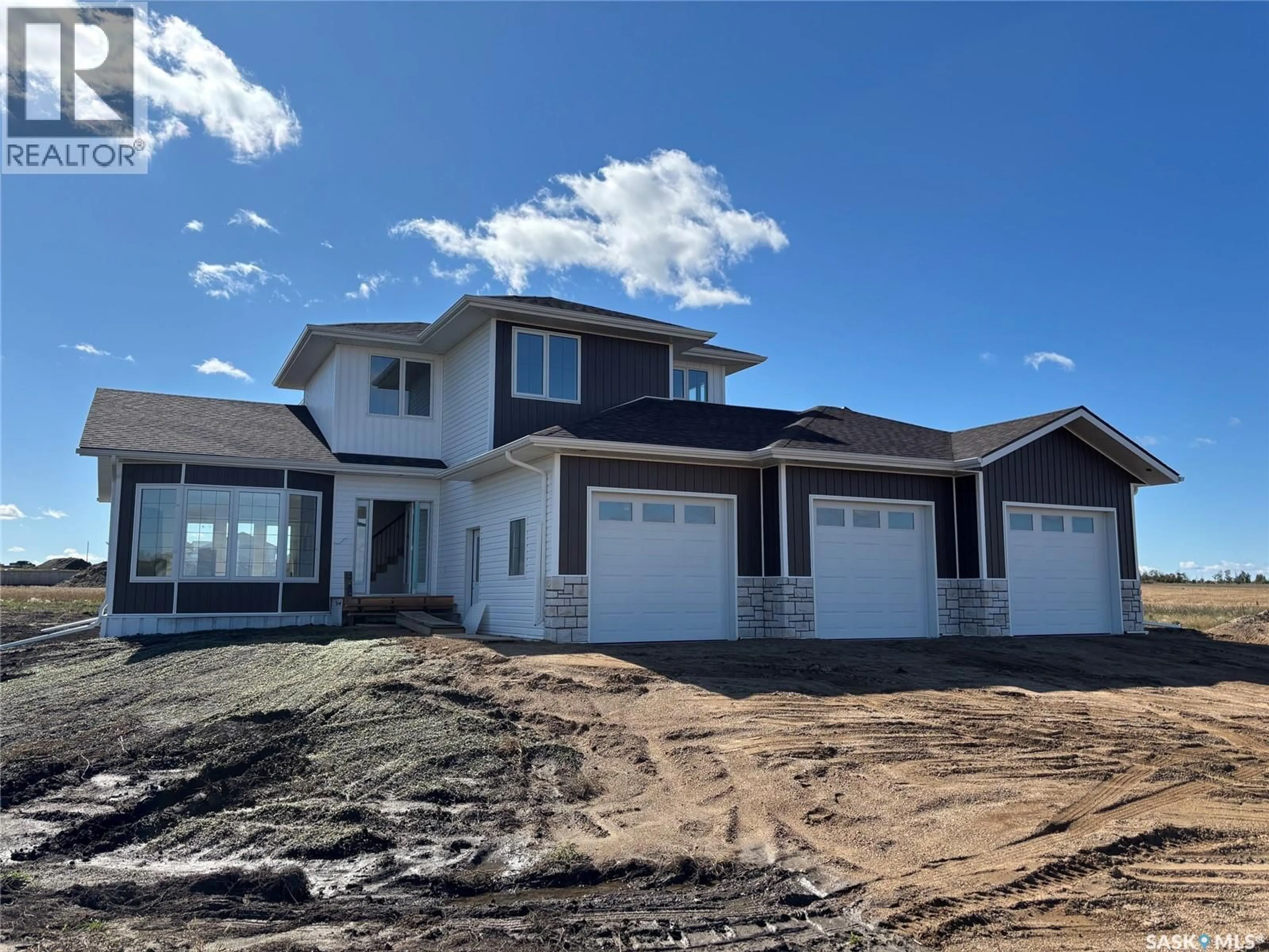 Home with vinyl exterior material, street for 49 MEADOWLARK TRAIL, Blucher Rm No. 343 Saskatchewan S7K3P3