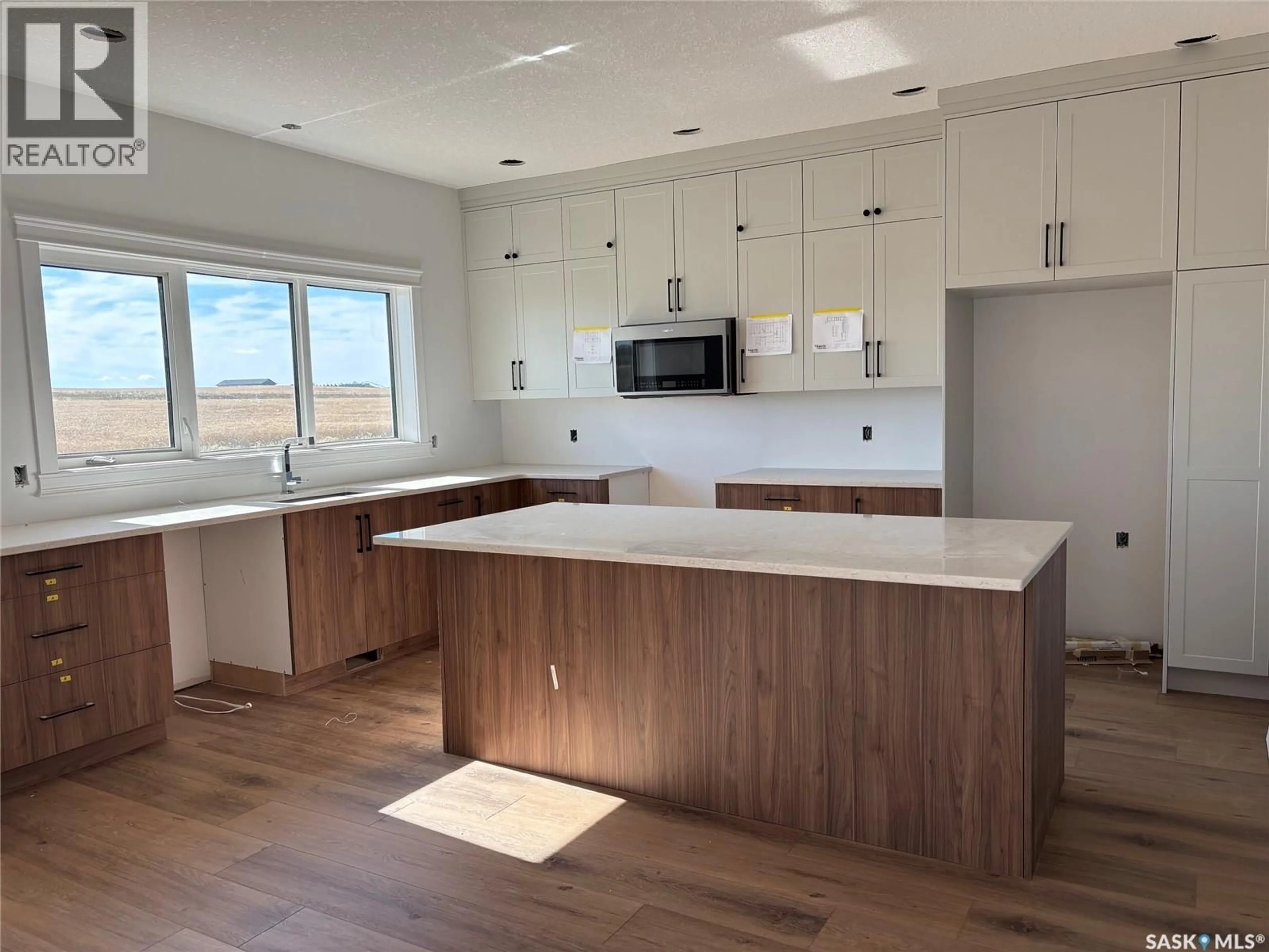 Open concept kitchen, wood/laminate floor for 49 MEADOWLARK TRAIL, Blucher Rm No. 343 Saskatchewan S7K3P3