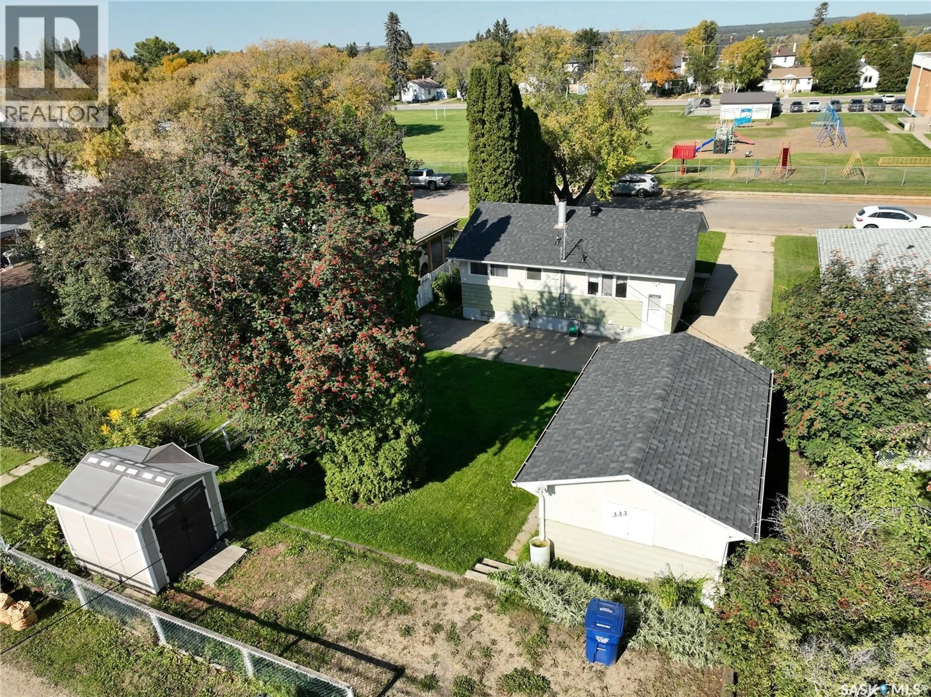 A pic from outside/outdoor area/front of a property/back of a property/a pic from drone, street for 333 24TH STREET, Prince Albert Saskatchewan S6V1R7