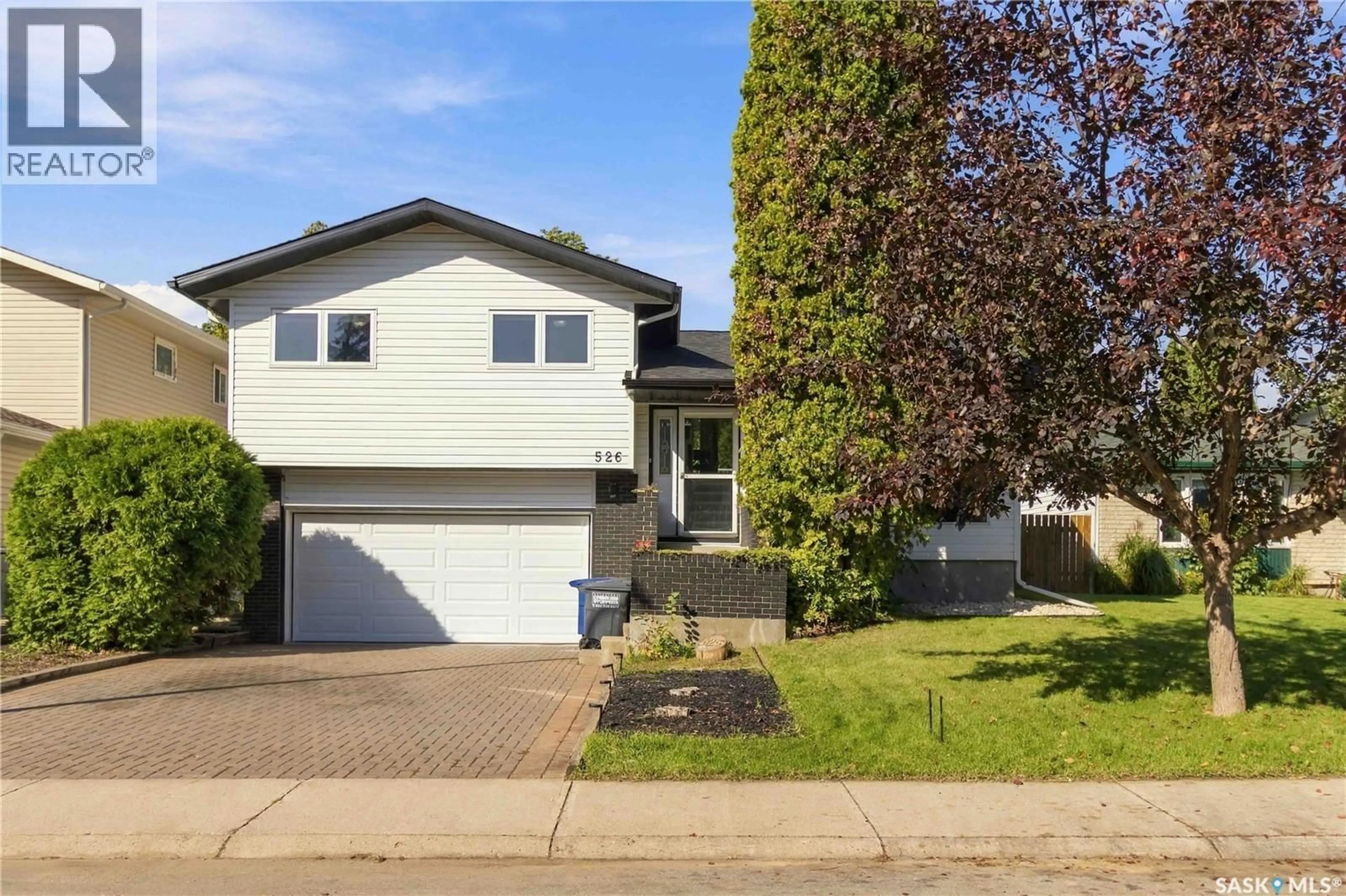 Home with vinyl exterior material, street for 526 TOBIN CRESCENT, Saskatoon Saskatchewan S7K4N8