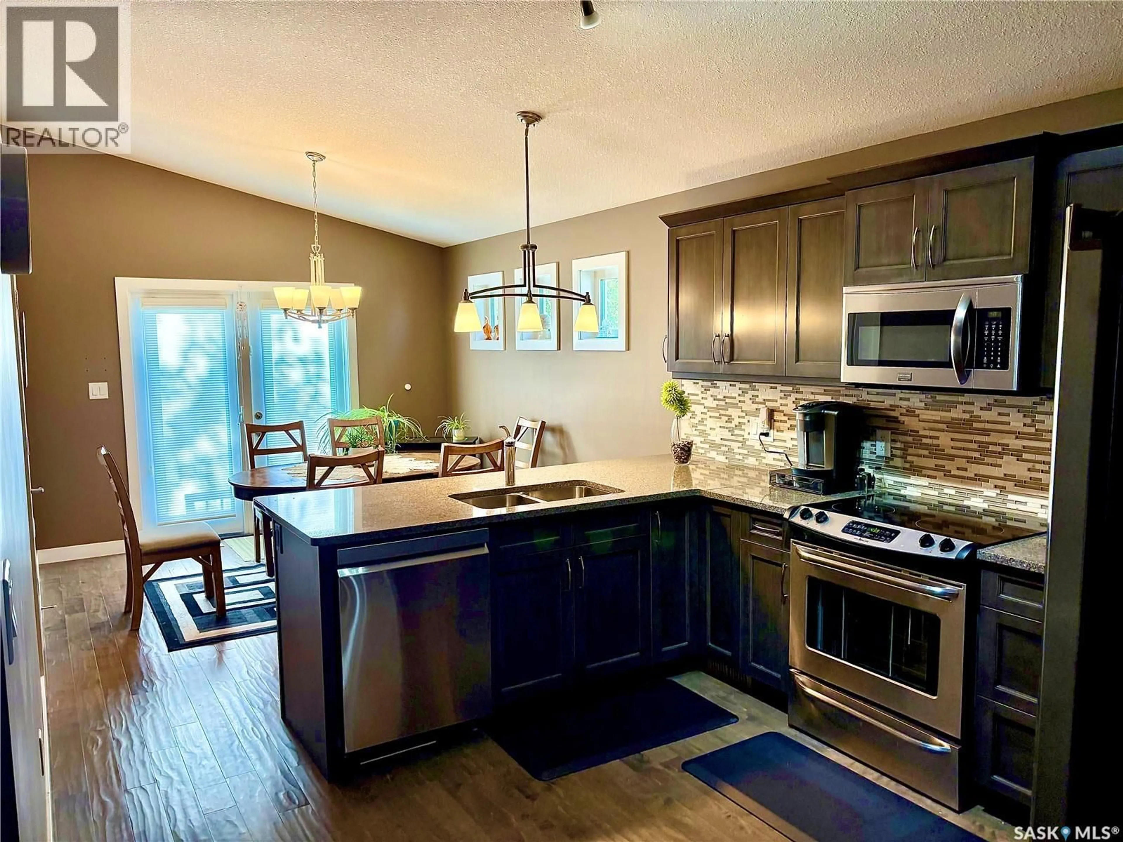Open concept kitchen, unknown for 206 THAUBERGER ROAD, Regina Saskatchewan S4Y0C3
